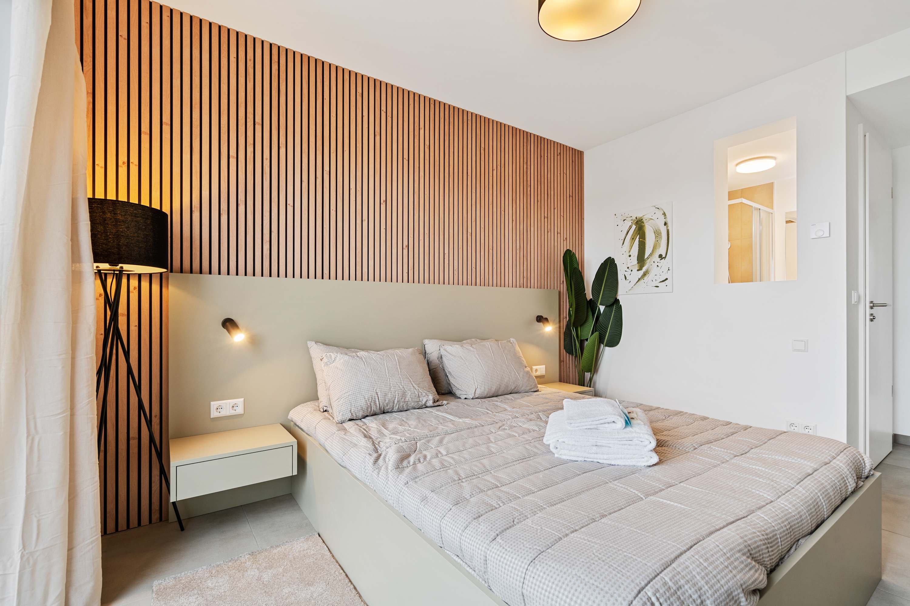 Compact Yet Elegant Interior – Smart layout featuring a comfortable bed, desk, and entertainment area.