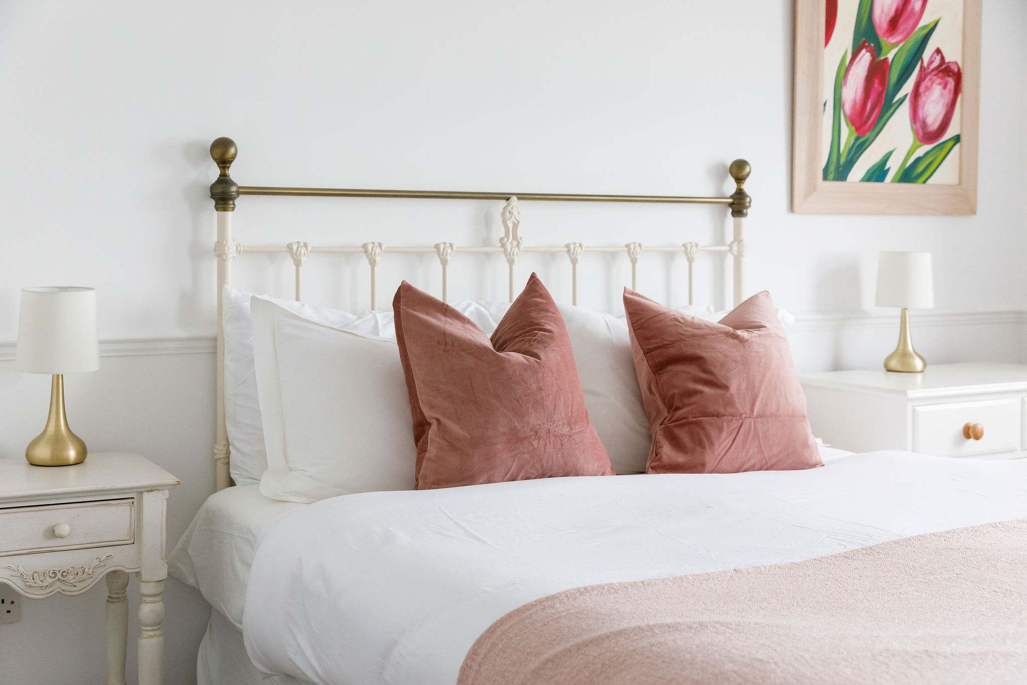 The master bedroom has a comfy king sized bed, sea views and a shower ensuite.