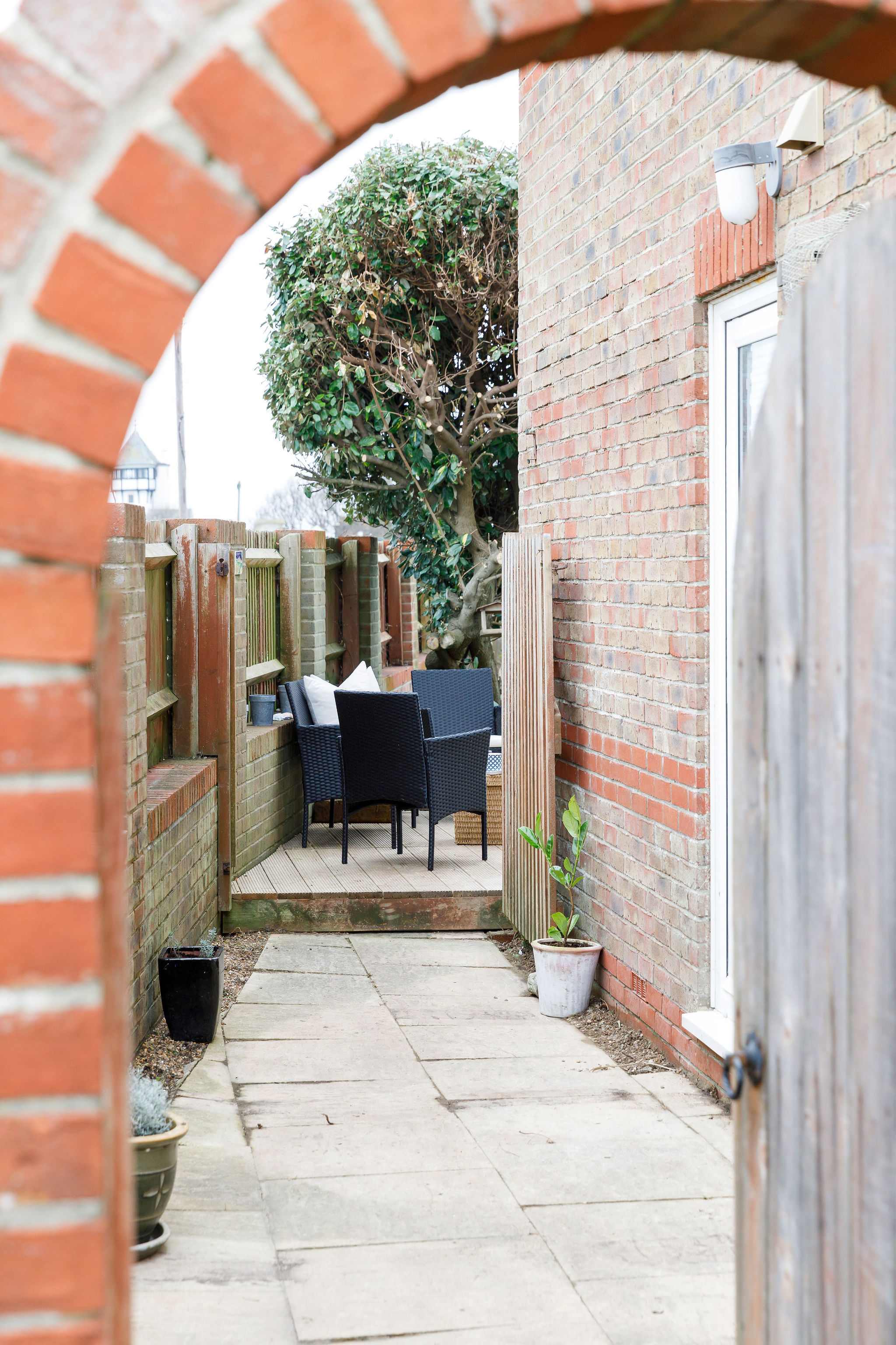 You can reach the back garden via a side gate, perfect for coming off the beach.