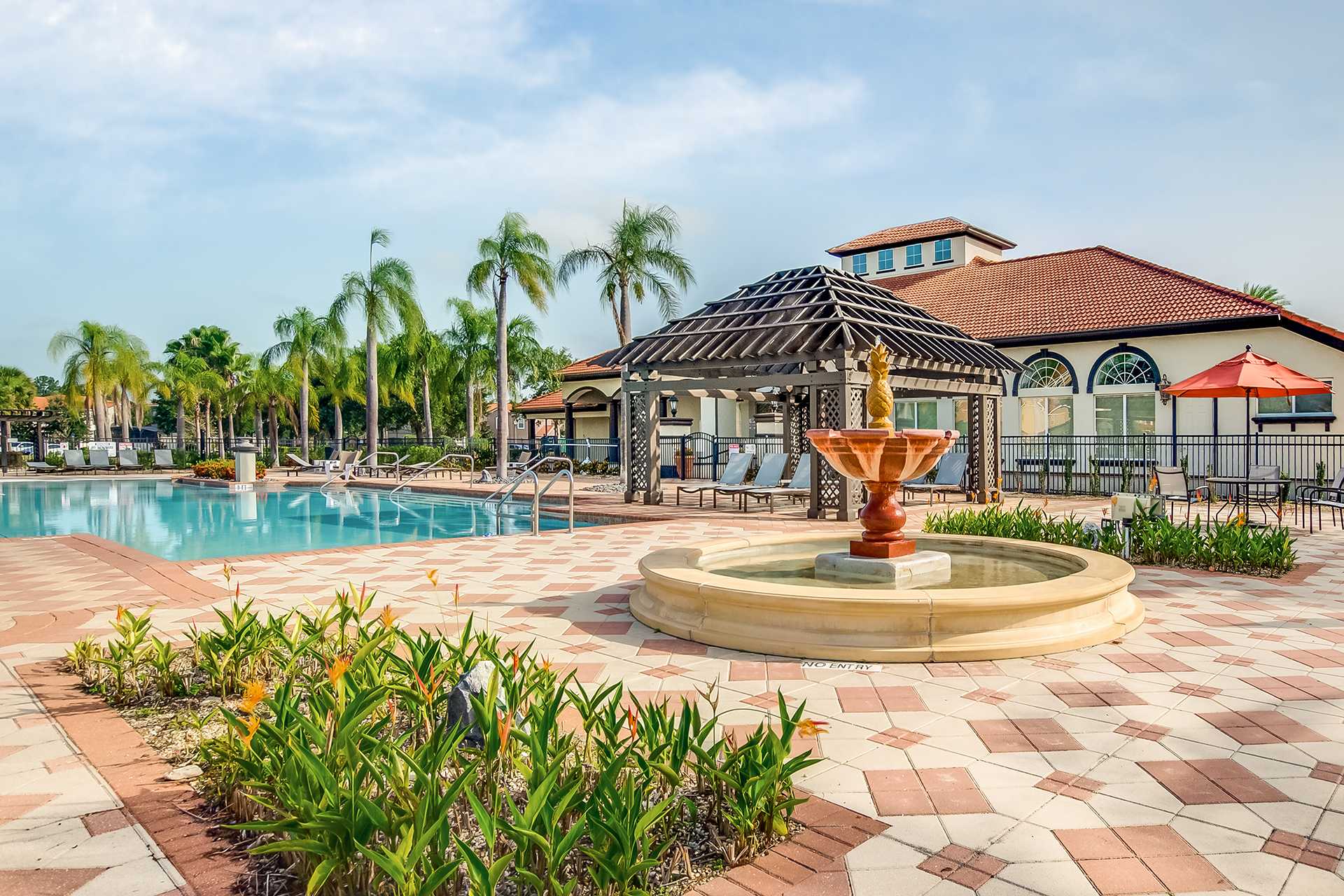 Stunning Fountain Surrounded By Beautifully Landscaped Gardens
