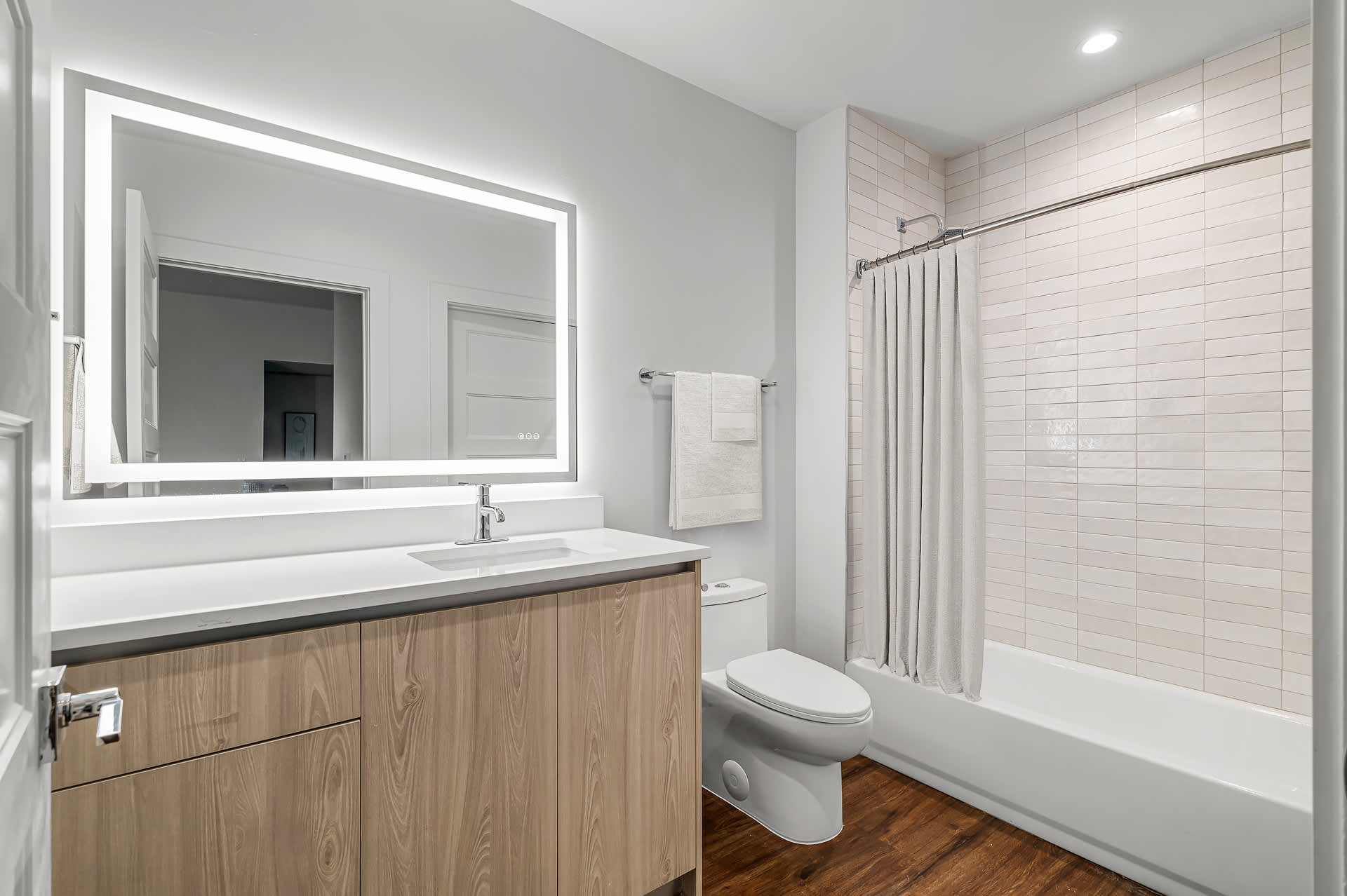 Modern bathroom with shower-in-tub design