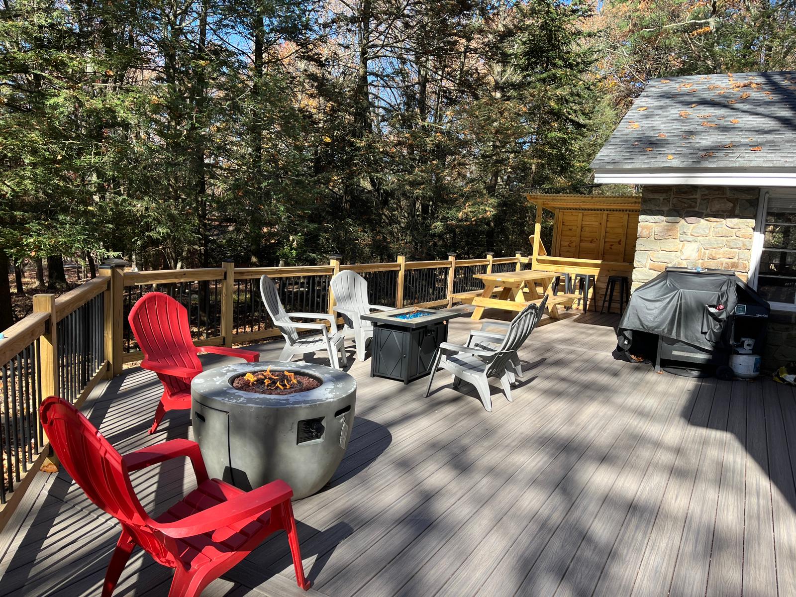 Gather around the fire pit with friends and family for warm conversations, roasted marshmallows, and starlit nights in this inviting outdoor space.