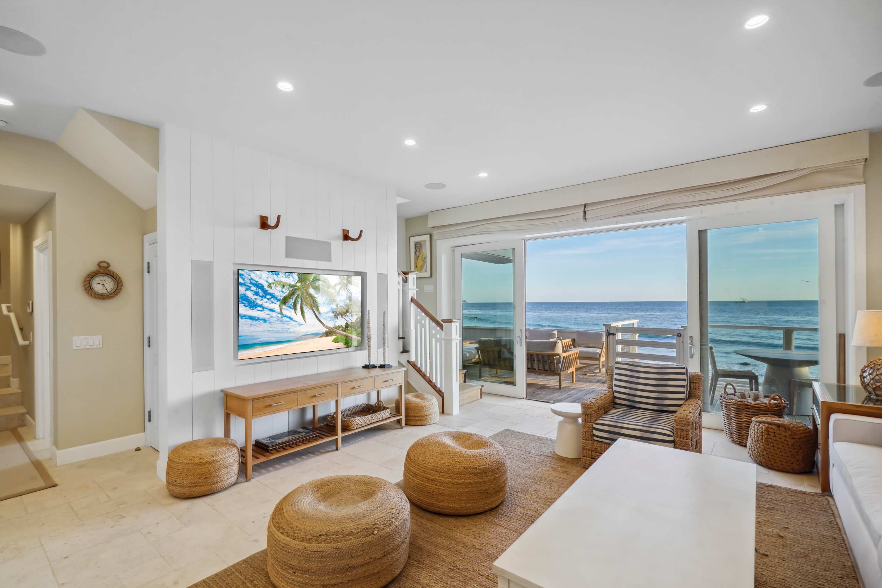 Coastal elegance shines in every detail, from natural tones to stunning views.