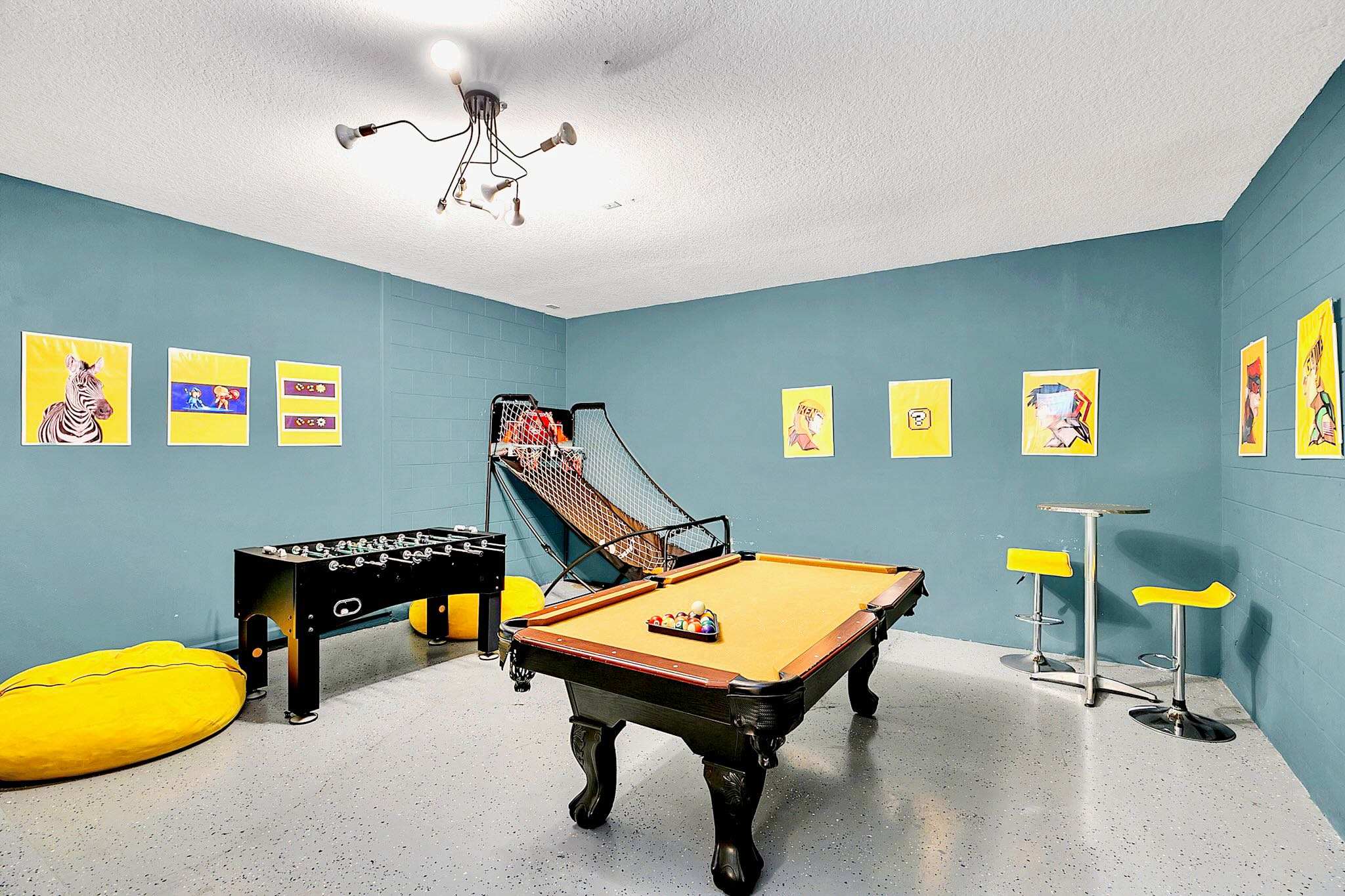 Themed Games Room With Foosball, Pool, And Big Screen TV