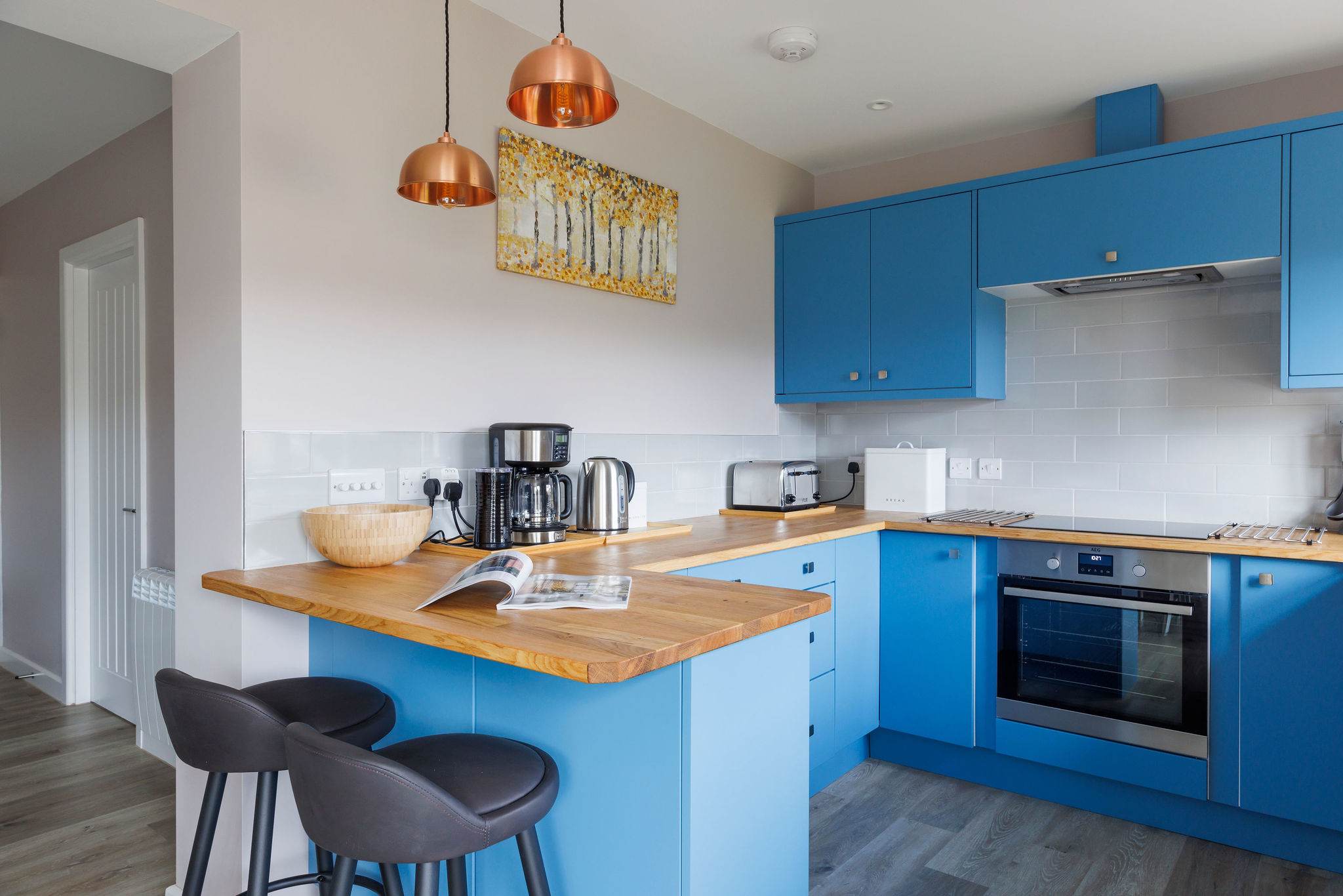 The fully equipped kitchen has all the modern amenities you need to prepare meals for family and friends.