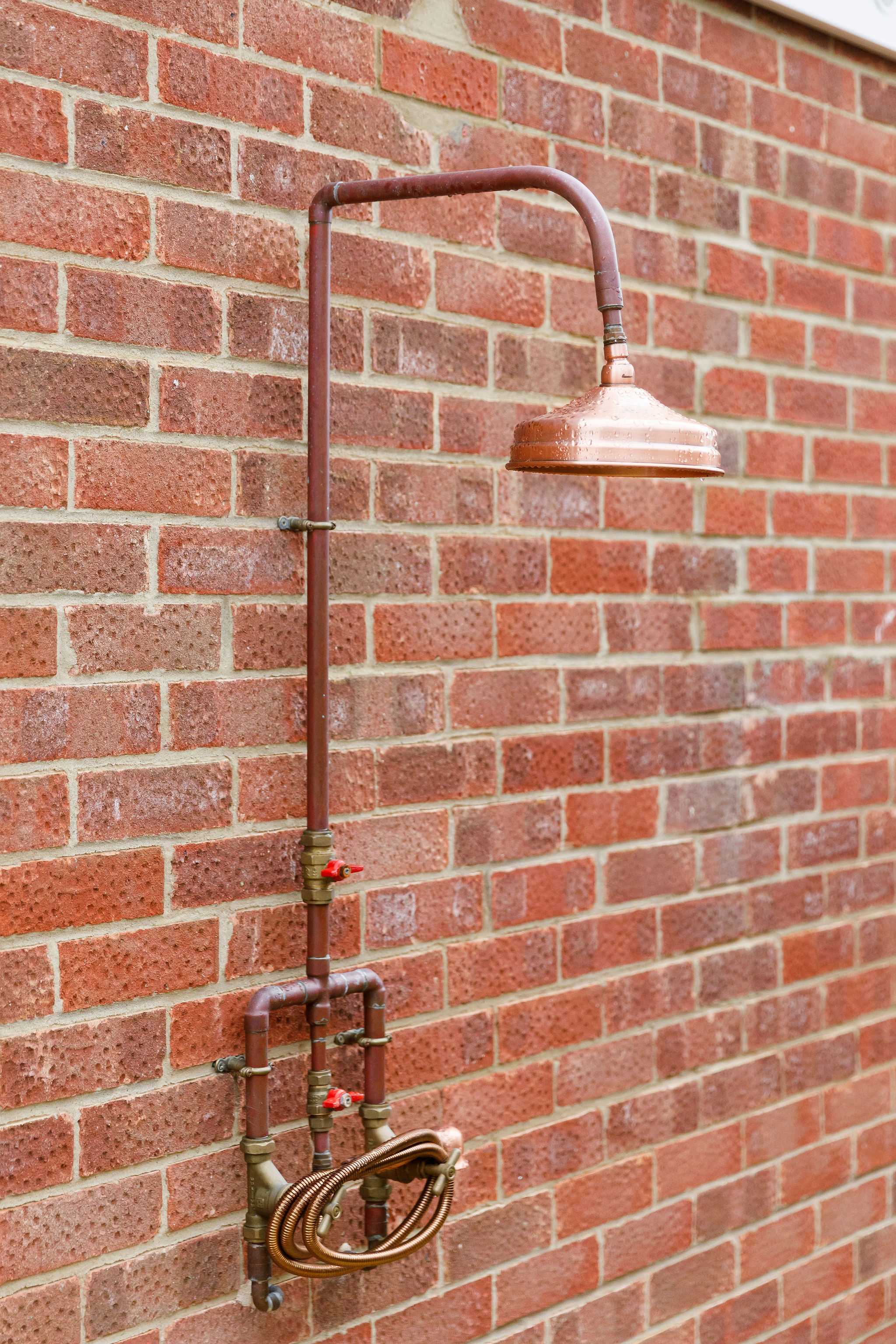 The home has an outside shower to rinse off sandy feet.