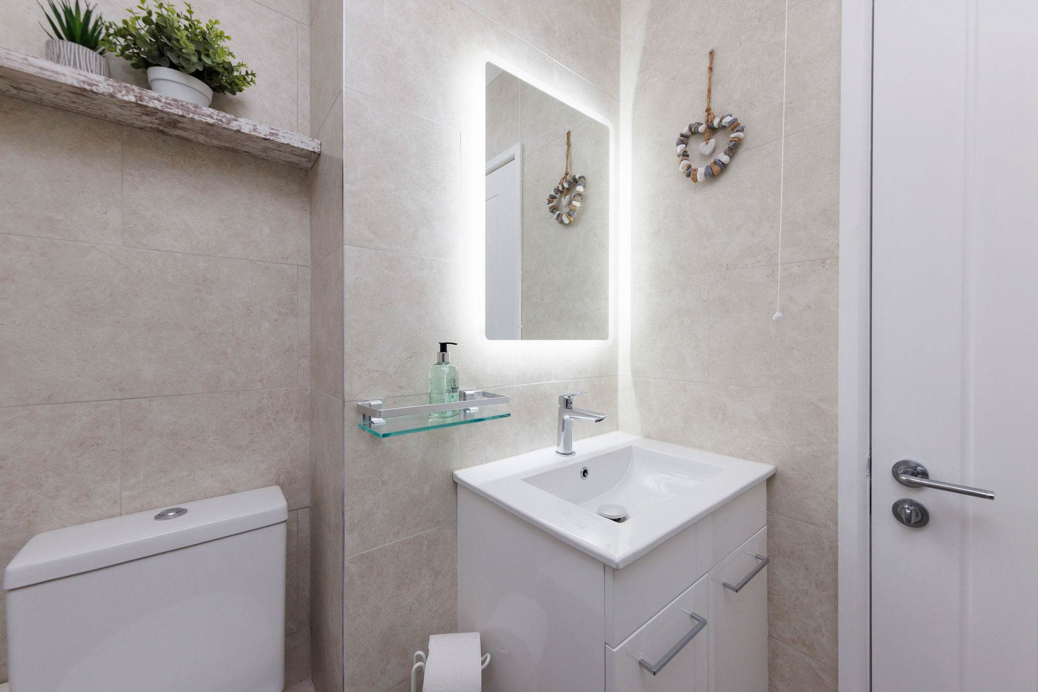 Freshen up after a day at the beach or exploring the local area, stocked with fresh towels and essential toiletries.