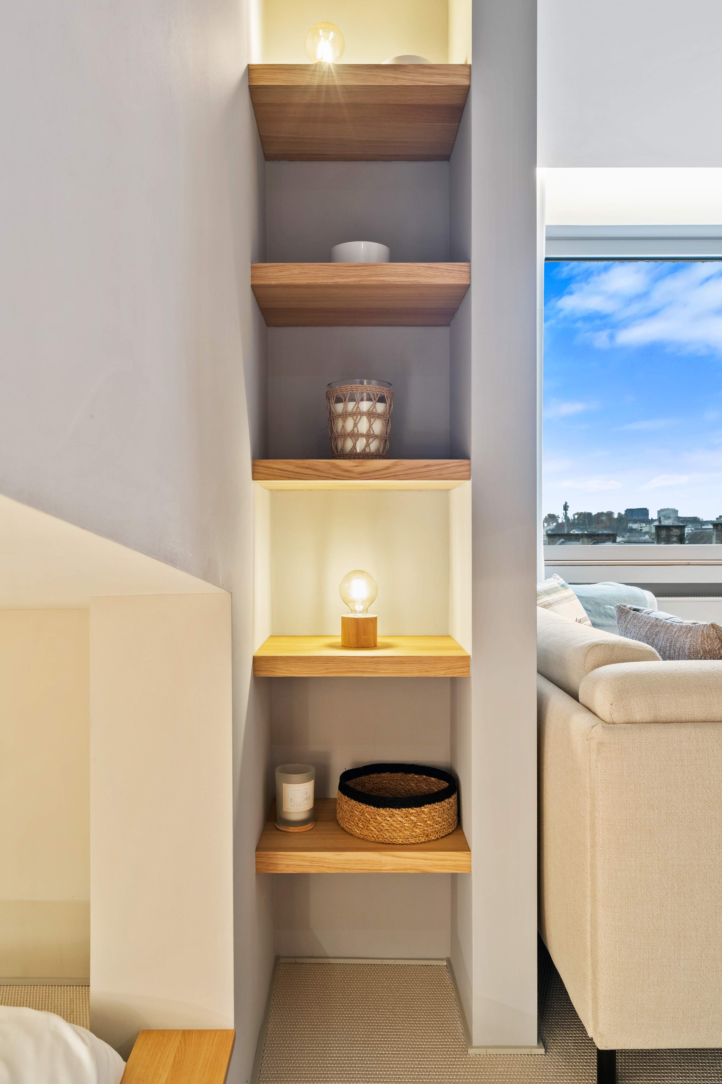 Ample Storage Solutions – Built-in shelves provide space for organizing your belongings.