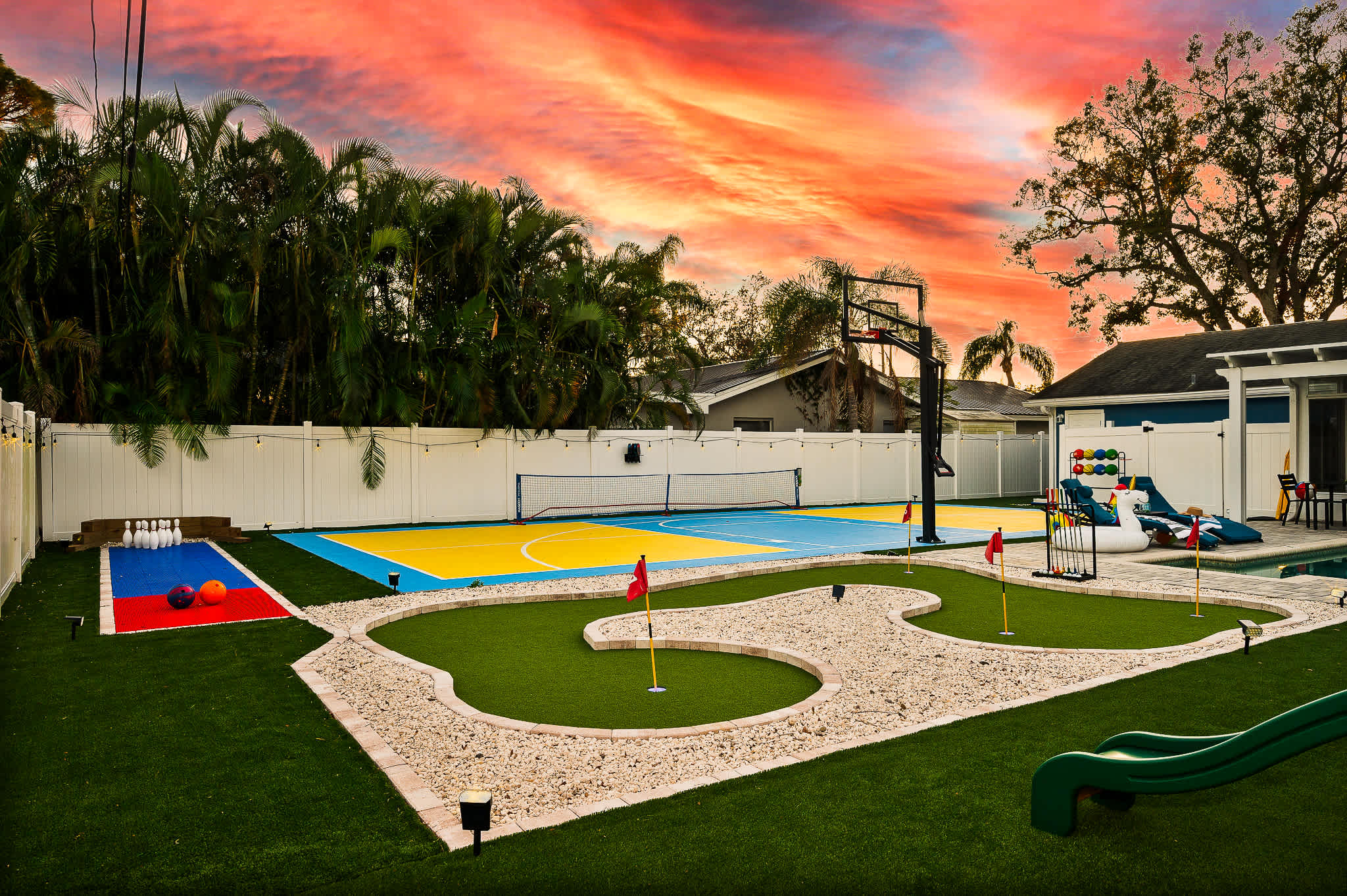 Backyard amenities, basketball + pickleball court, bowling lane, and mini golf