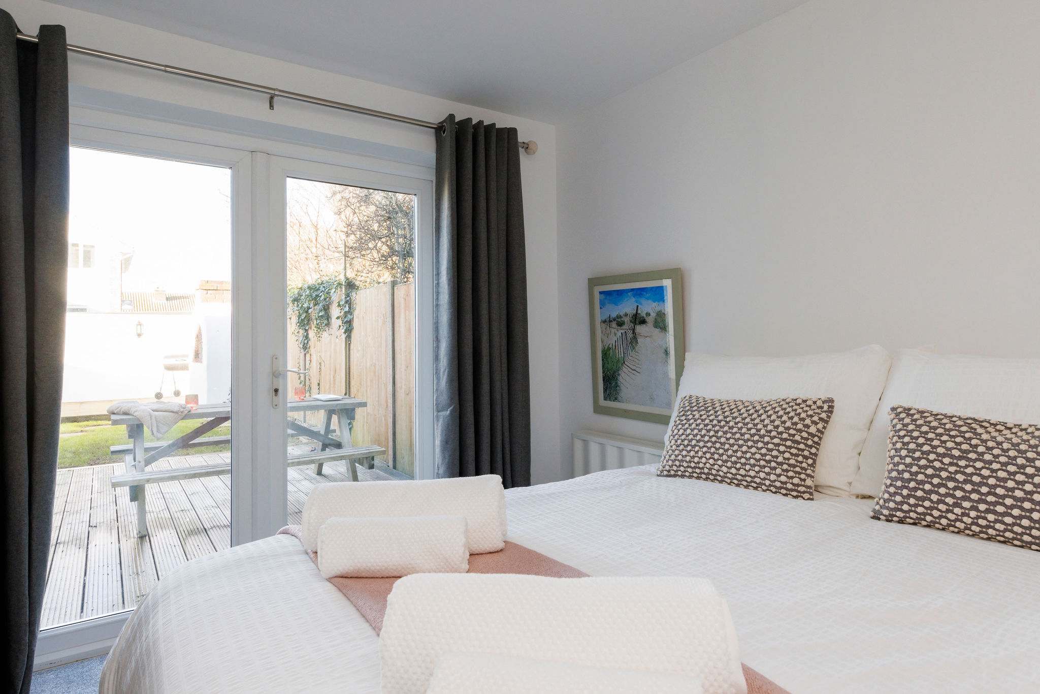 Bright and airy bedroom with direct garden access