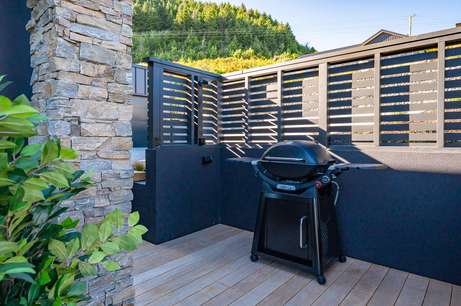 Unwind in the barbecue area, a fantastic outdoor space perfect for entertaining guests or relaxing with family while soaking in the alpine scenery.