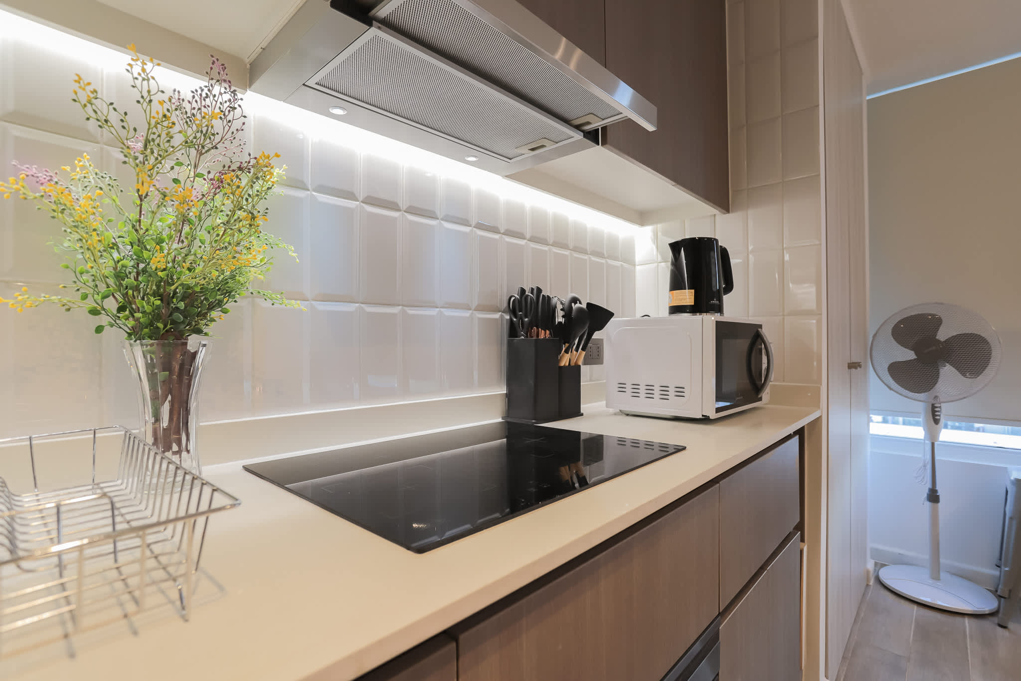 Sleek and modern kitchen with all essentials for a cozy stay in the heart of Chile.