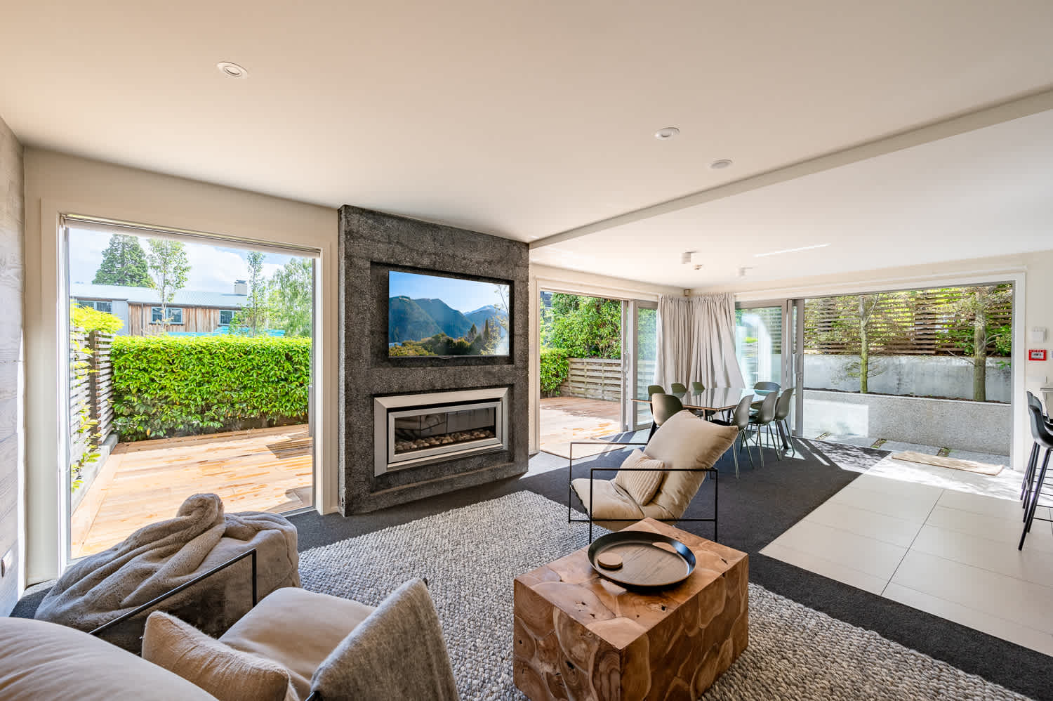 Modern Comfort with Scenic Views
This spacious living room blends modern design with cozy comfort, providing the ideal spot to take in the mountain views. A perfect blend of style and serenity.