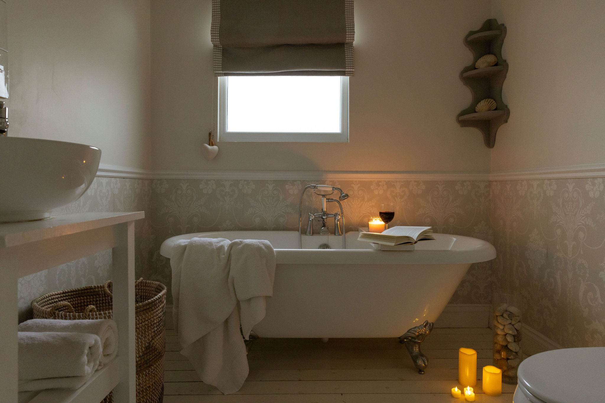 A beautiful roll top bath in the master bedroom's ensuite.