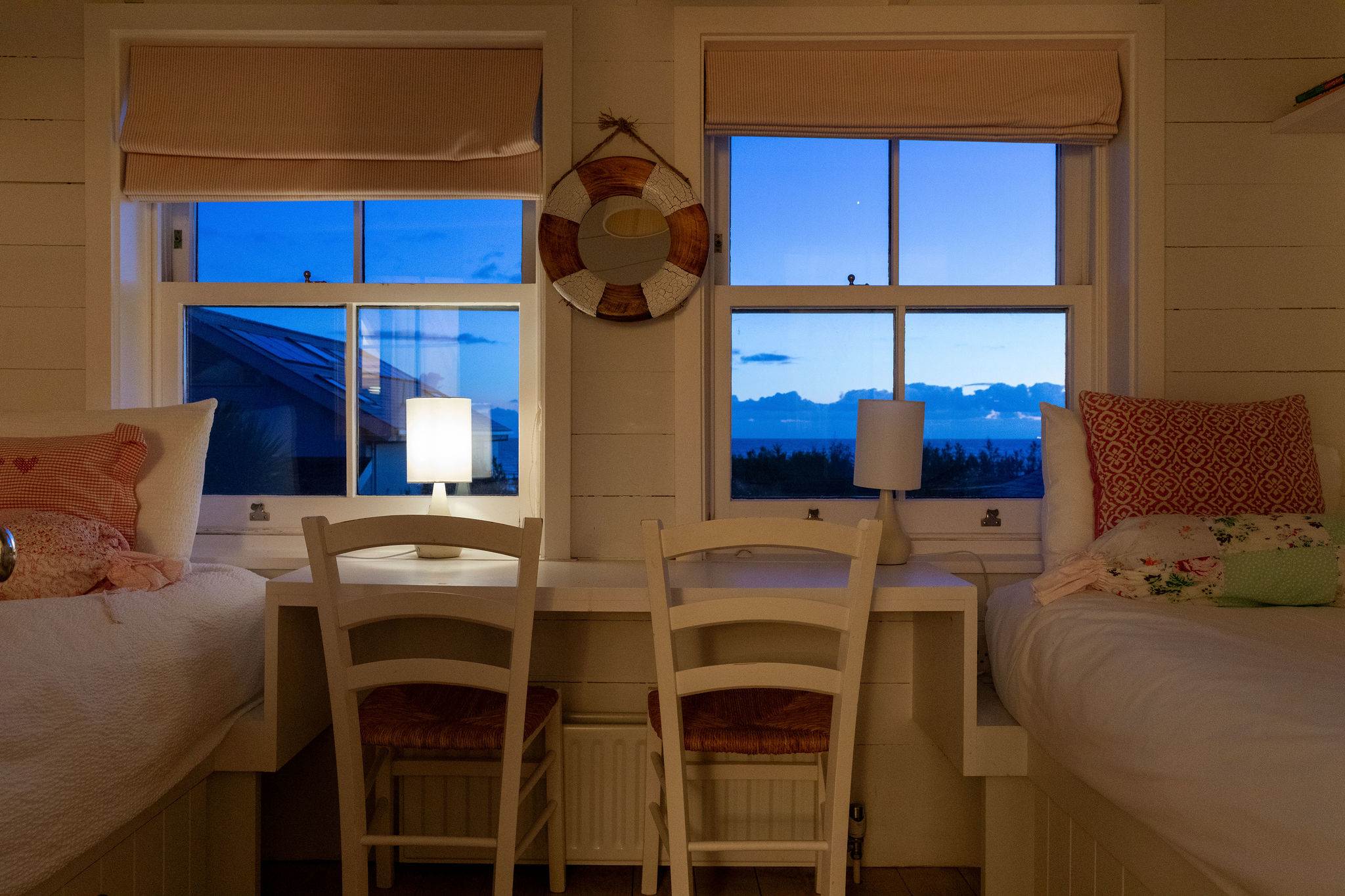 As night falls, get cosy indoors and fall asleep to the sound of waves.