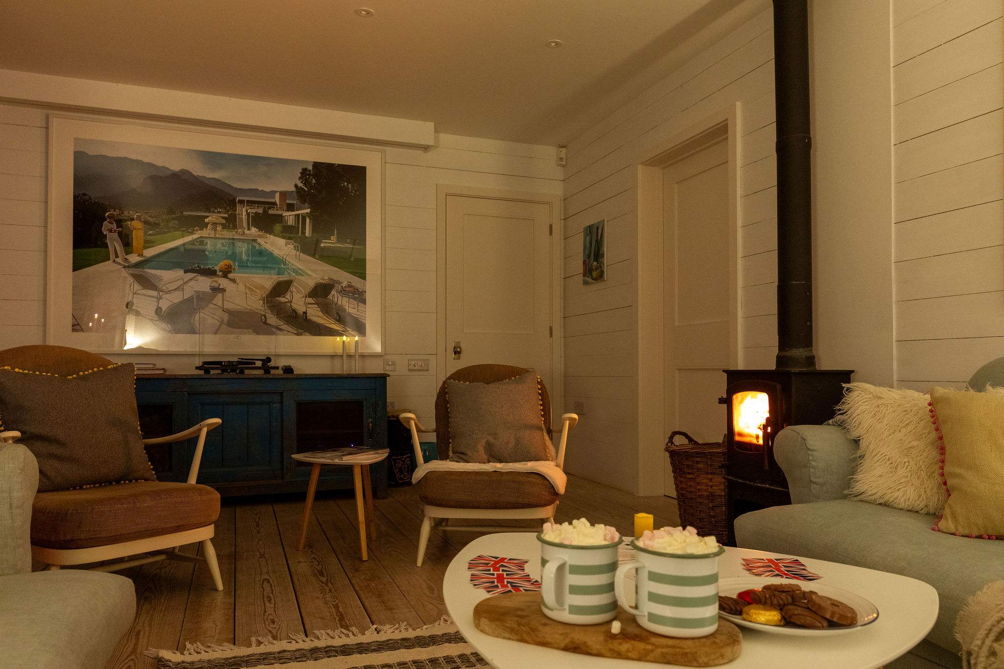 Looking for a winter break? New Coast House offers a cosy seaside retreat, with a log burner, comfy sofas and cosy throws.