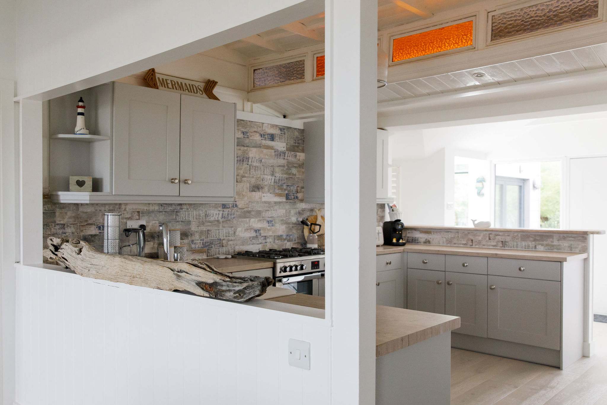 The kitchen is open so you can socialise with friends/family whilst being in there.