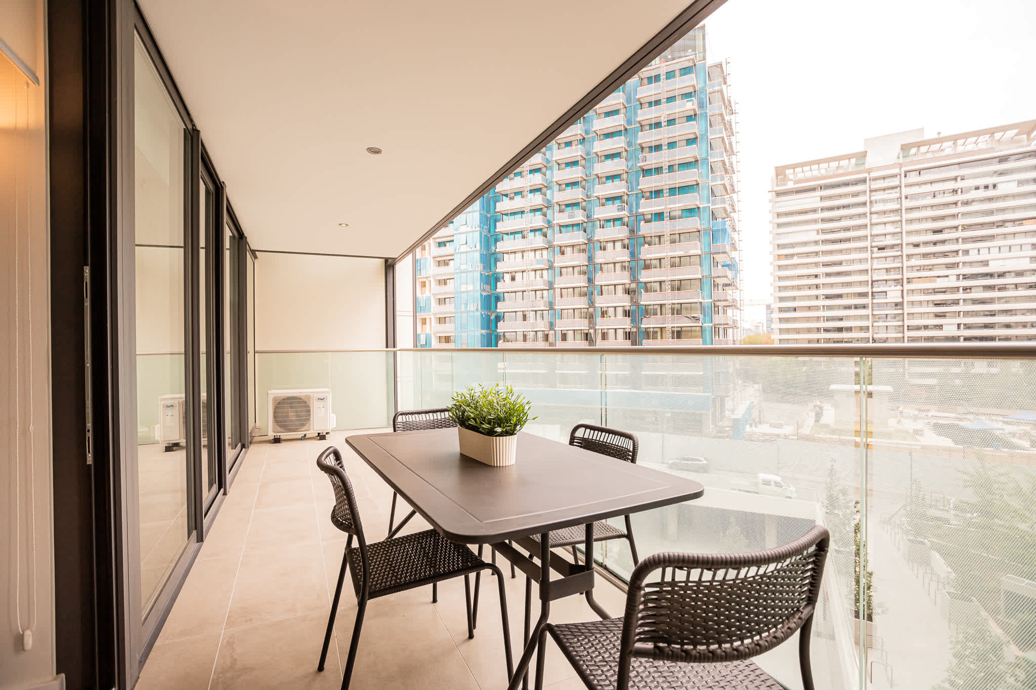Relax on your private balcony with city views, perfect for enjoying morning coffee or evening meals in the heart of Chile.