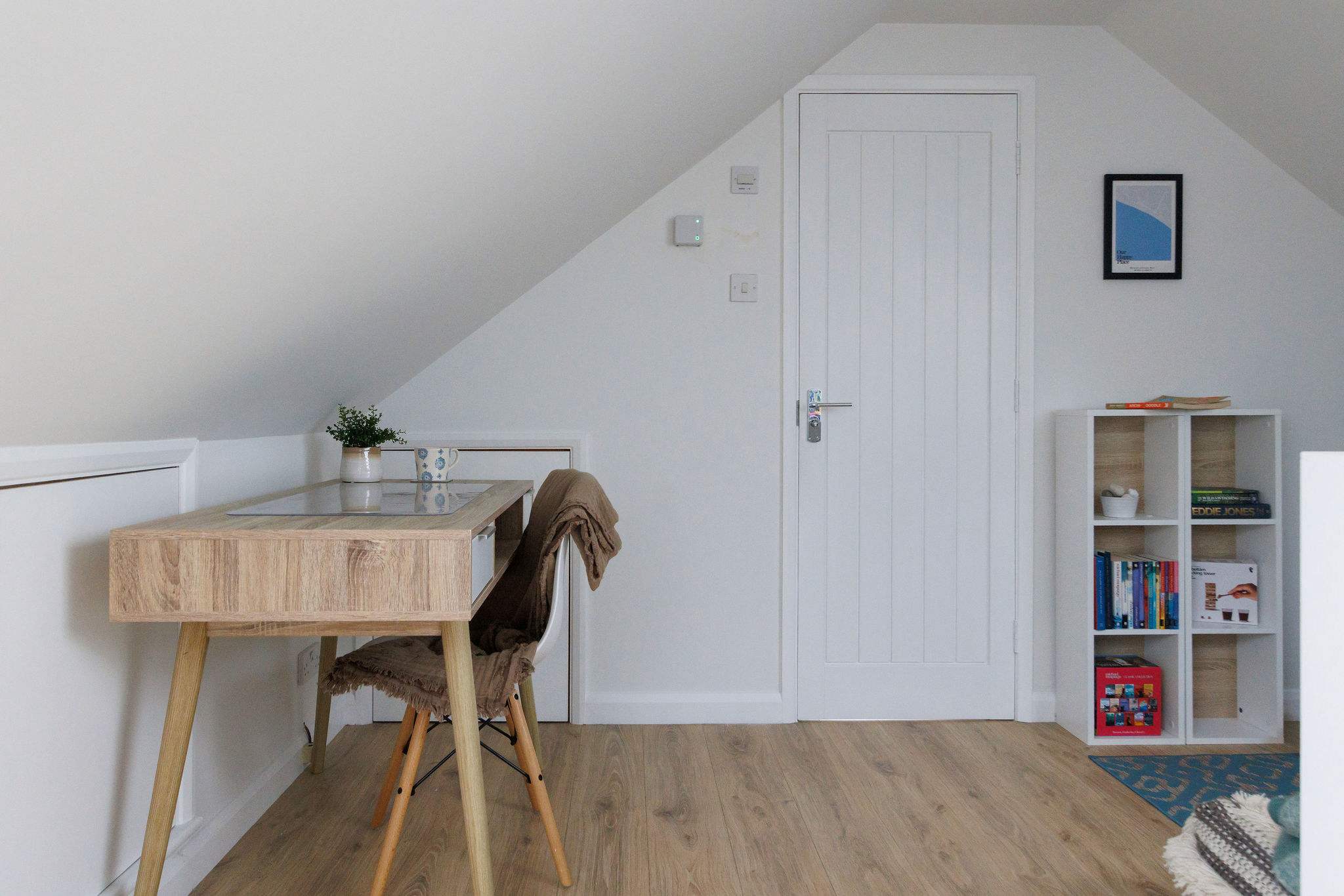 The landing has a desk and chair, perfect for those that need to catch up on a bit of work or study during their stay.