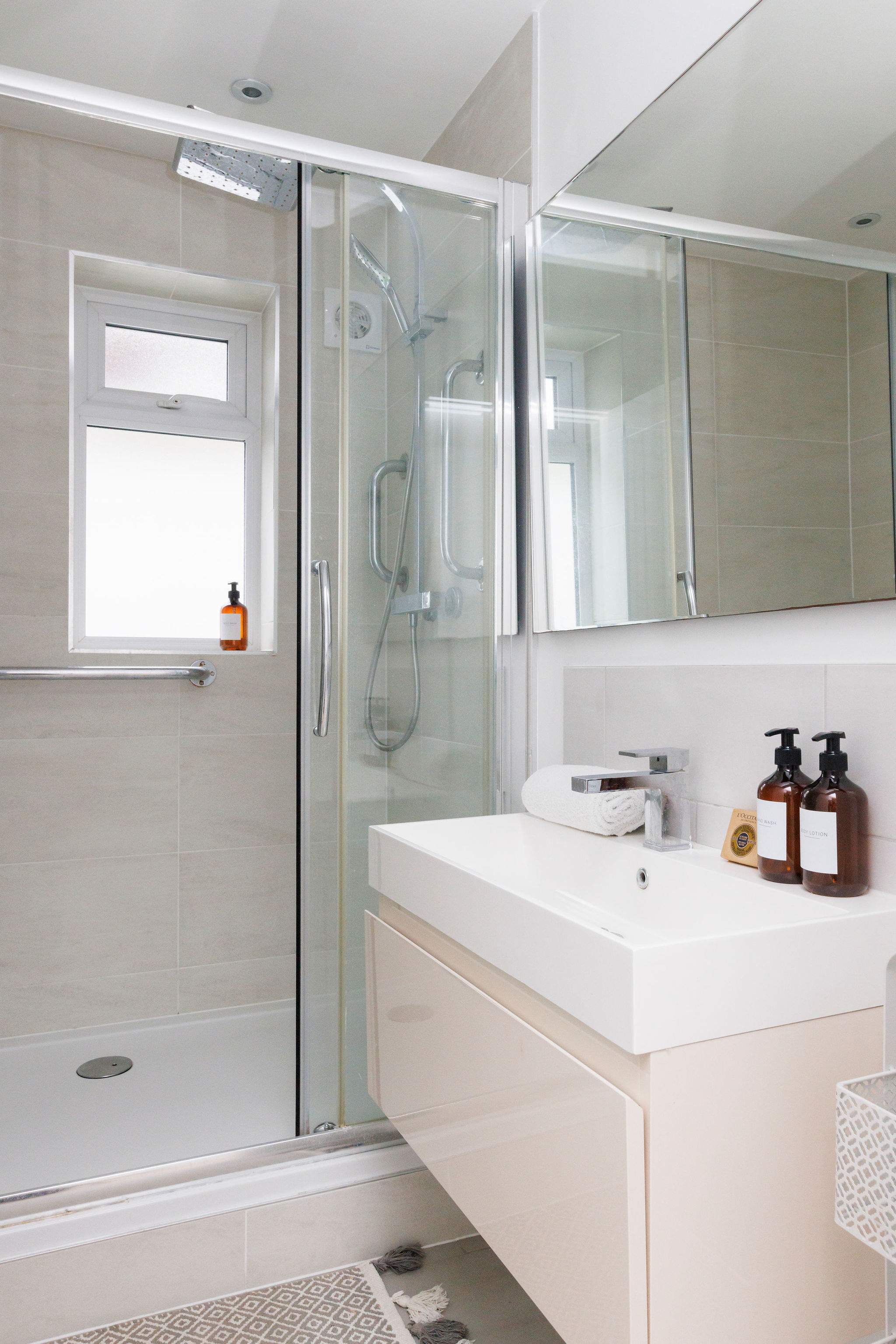 Spacious downstairs shower room, with WC and sink.