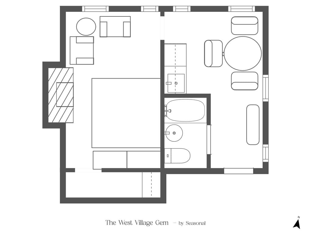 Floor plan of The West Village Gem, showing the bedroom, bathroom, and kitchen and dining layout.