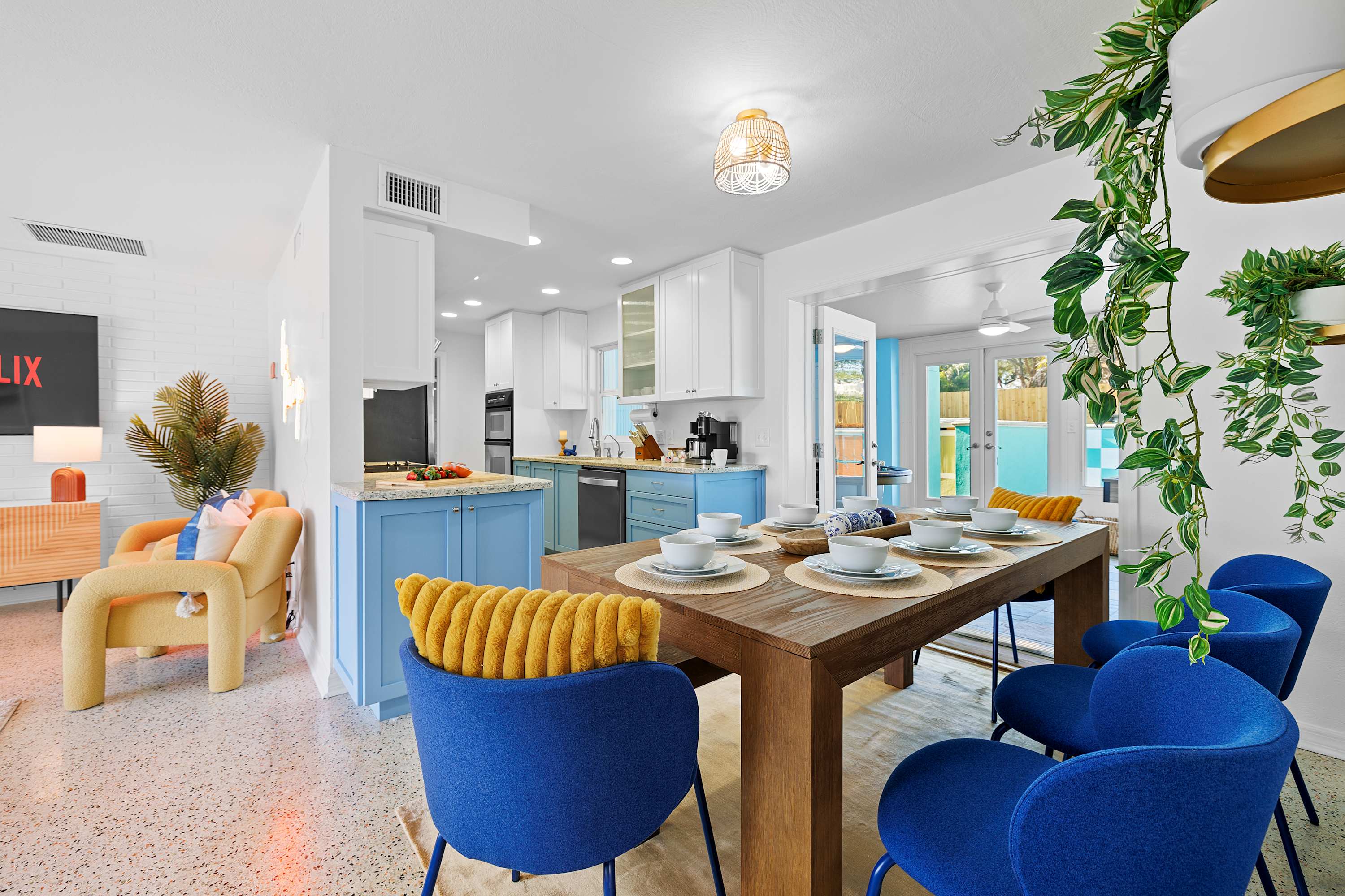 Airy dining area w/ modern touches and a cheerful, welcoming vibe.