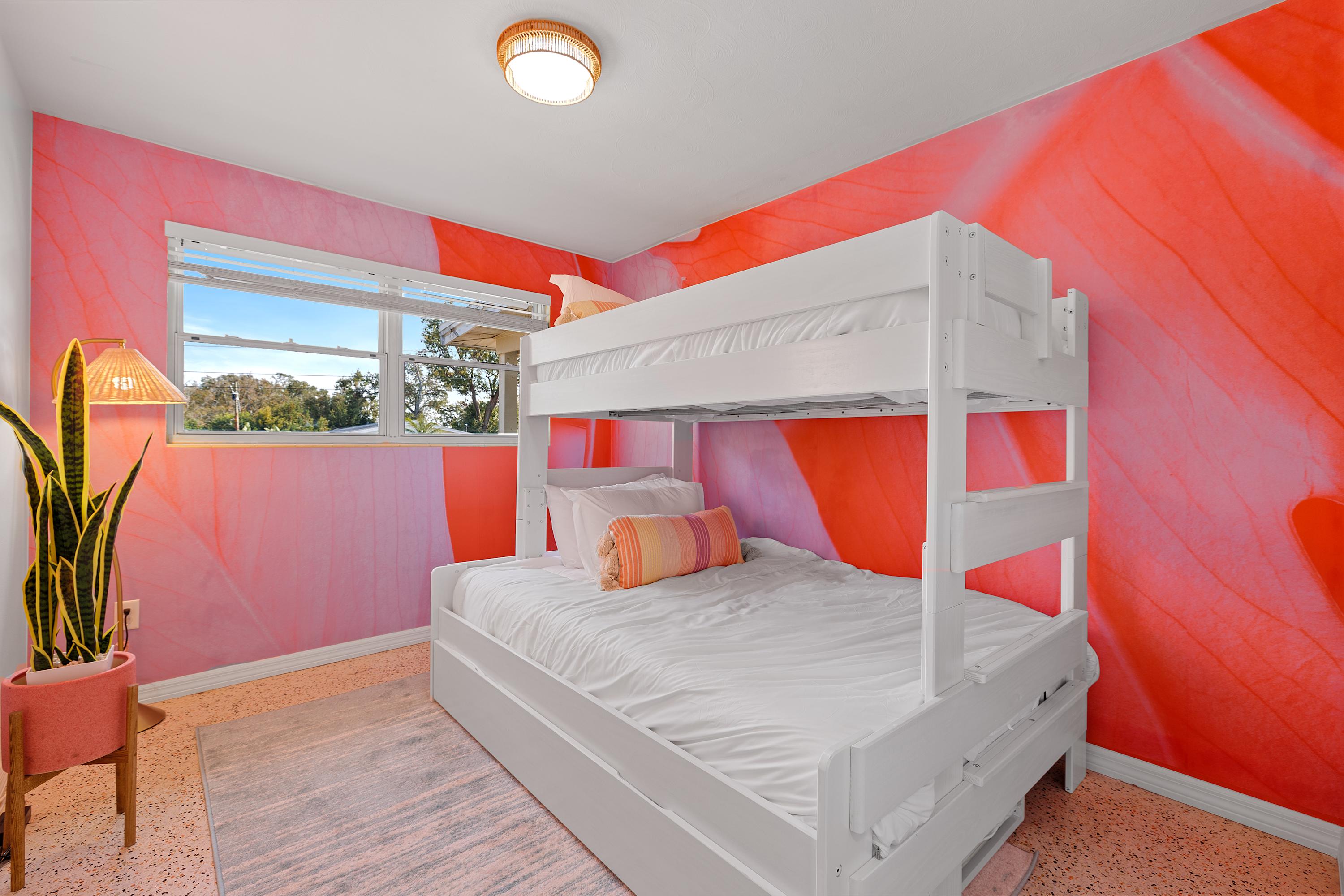 Fun bunk-style bedroom w/ bright colors and a playful design.