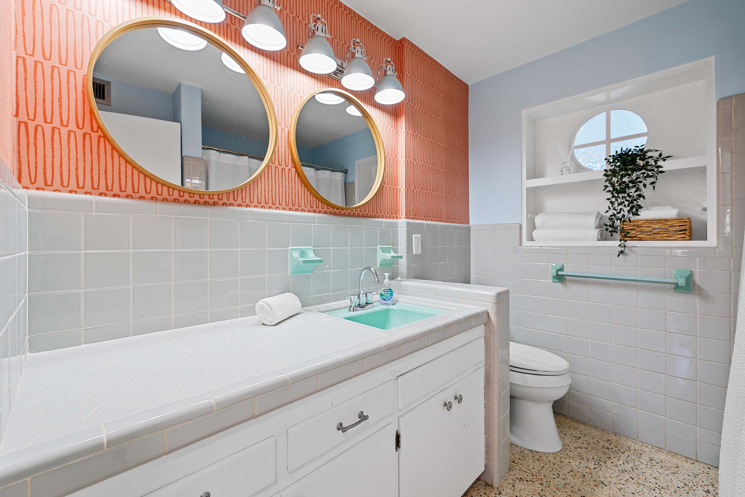Modern bathroom vanity w/ sleek finishes and a fresh, airy feel.