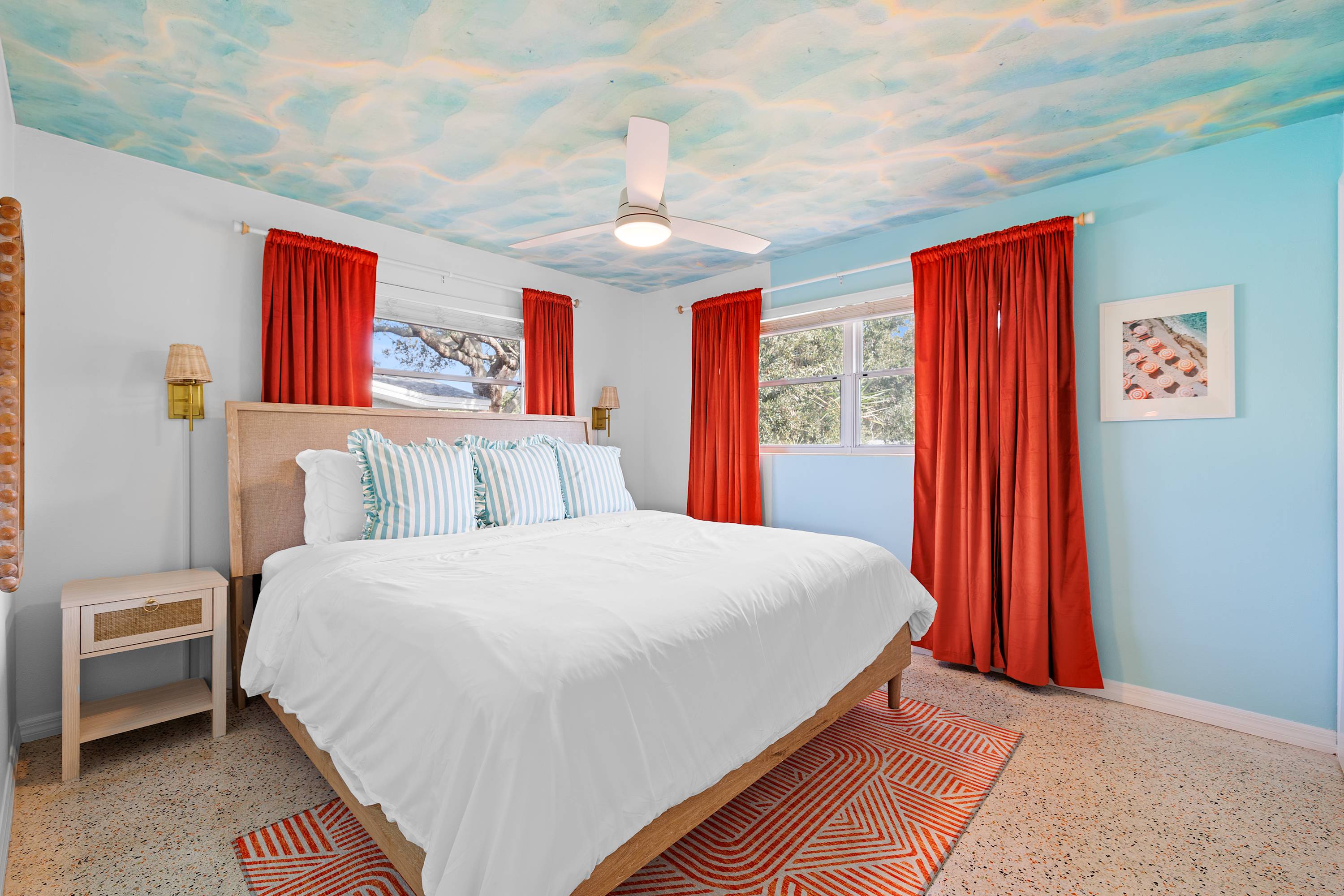 Cozy bedroom w/ bold accents and a calm setup for restful nights.
