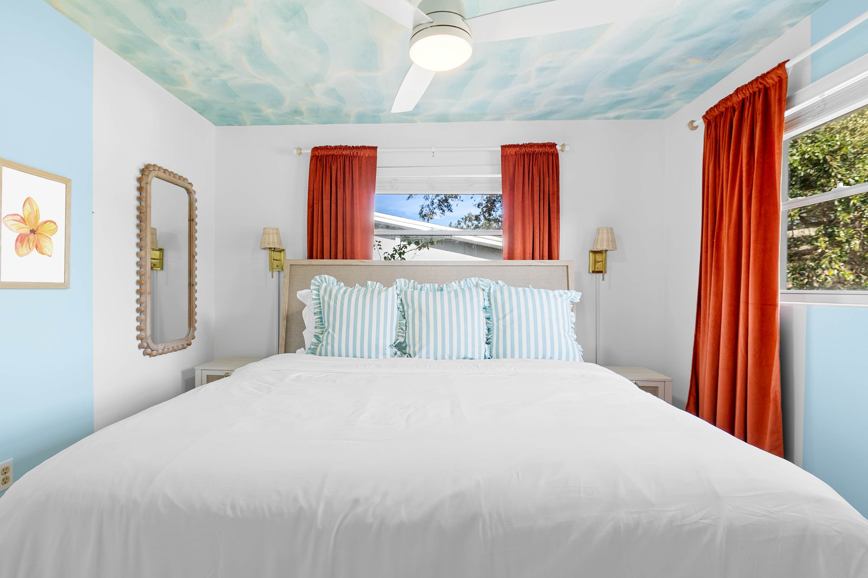 Cozy bedroom w/ warm accents and an inviting, restful atmosphere.