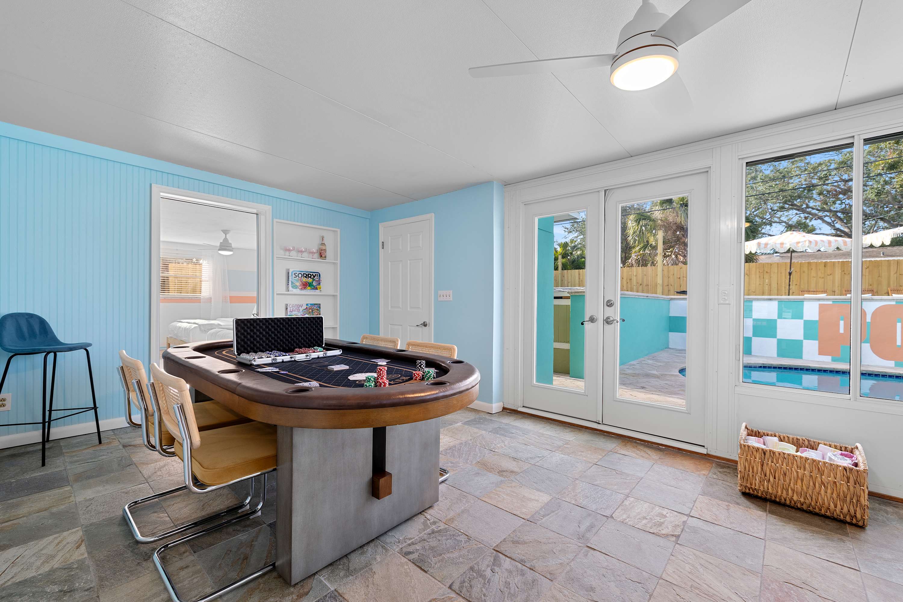 Sleek game area w/ pool table and lounge seating, perfect for group hangs.