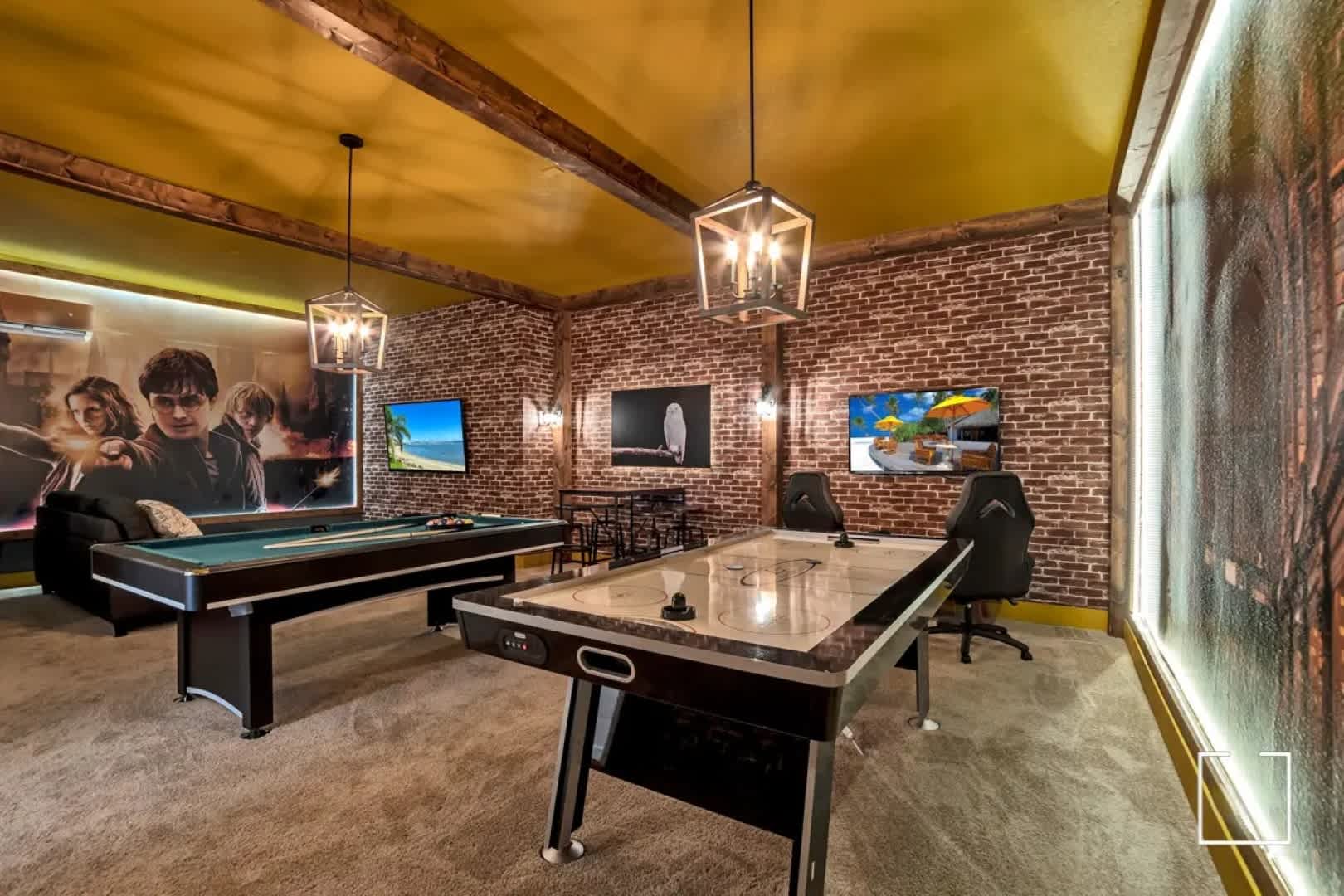 Experience fun and excitement in this themed game room with pool and air hockey tables, perfect for family entertainment!