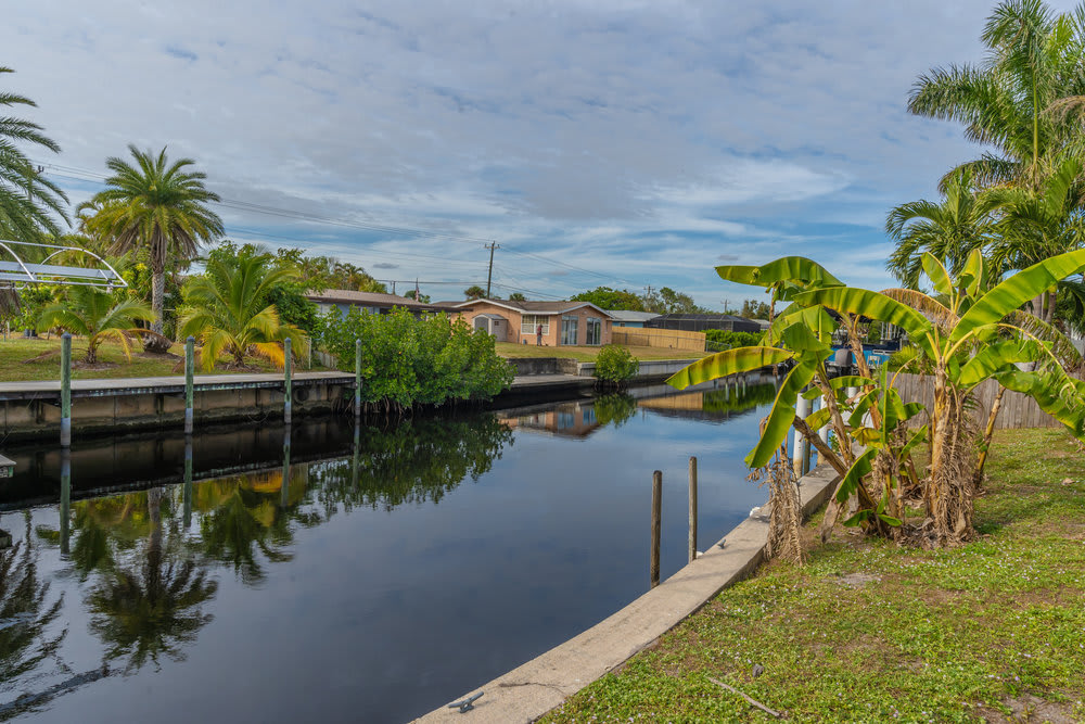 Atlantic Circle Canal & Pool Home - Picture 1