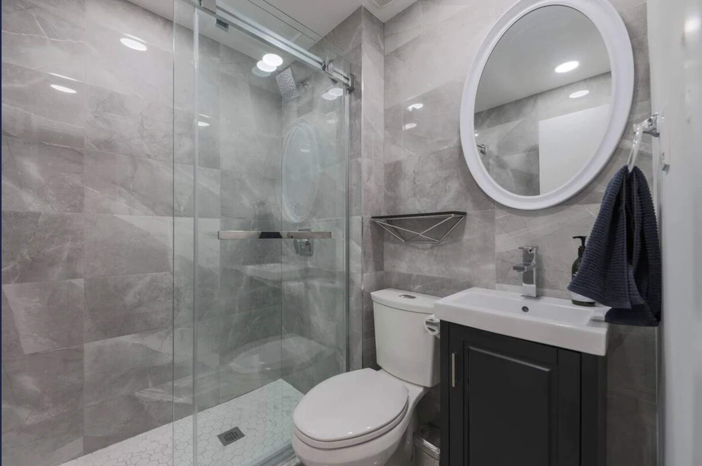 Full modern bathroom with standing shower