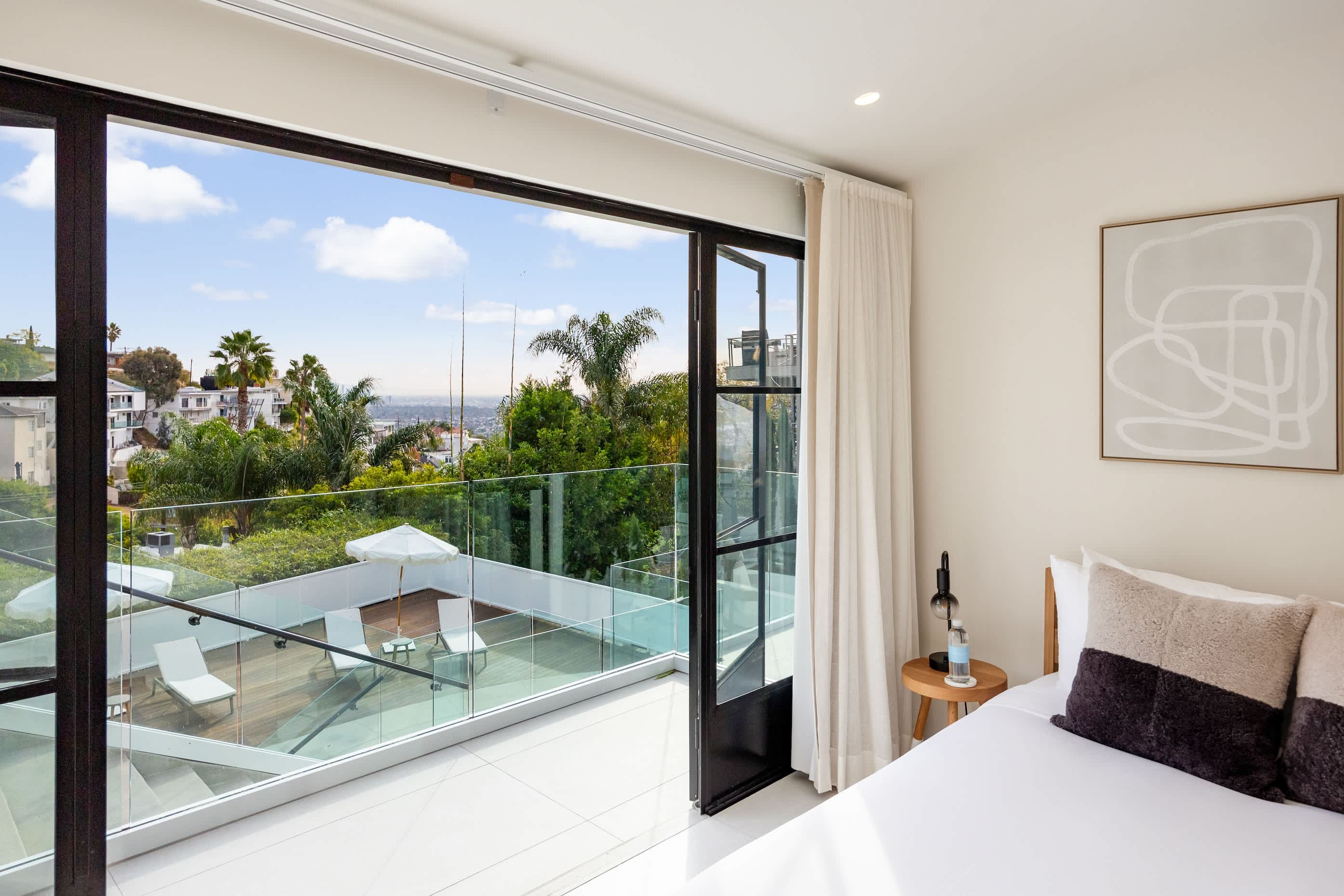Find calm in a bedroom with unmatched views.