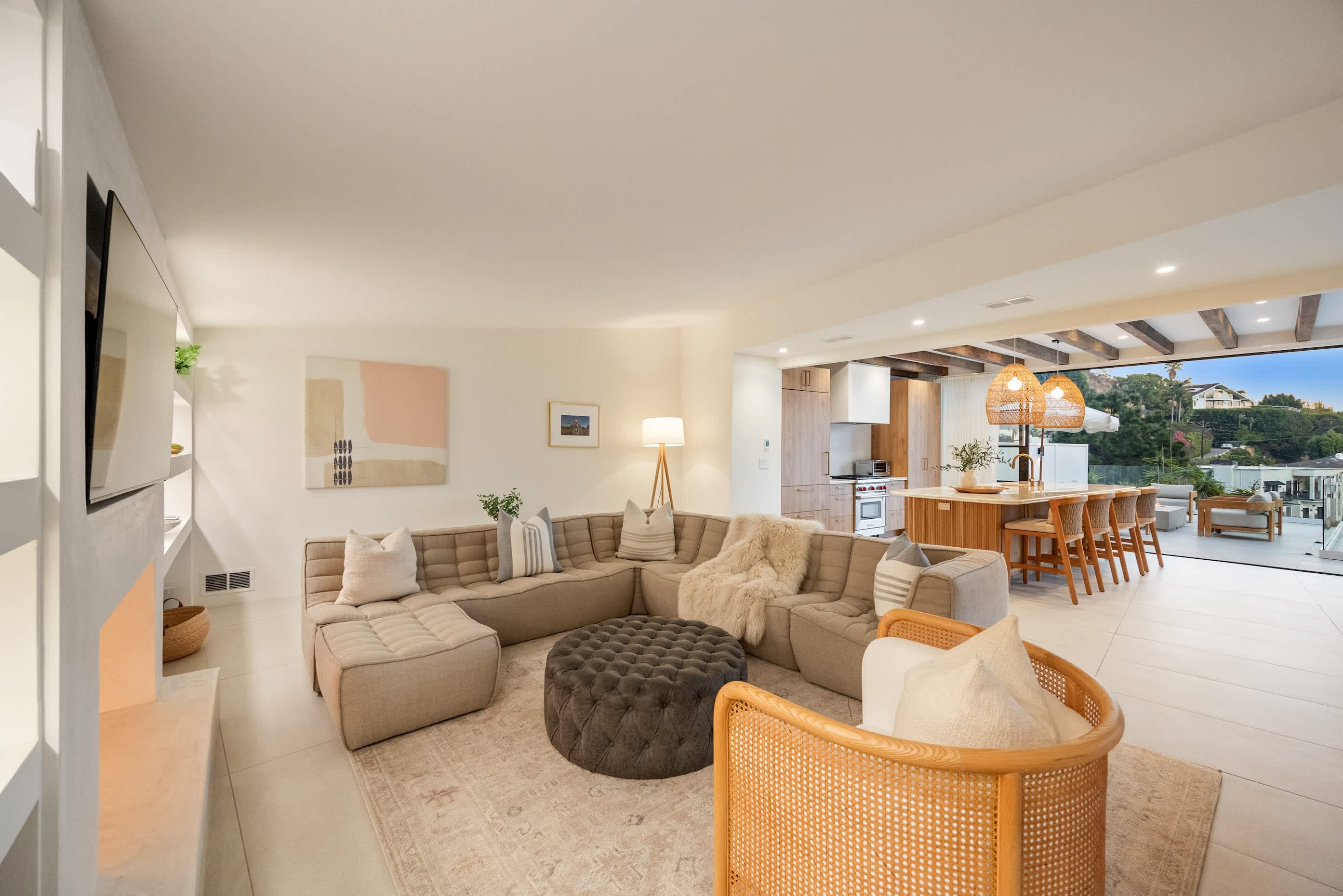 Relax with open views, natural light, and a warm, inviting design.