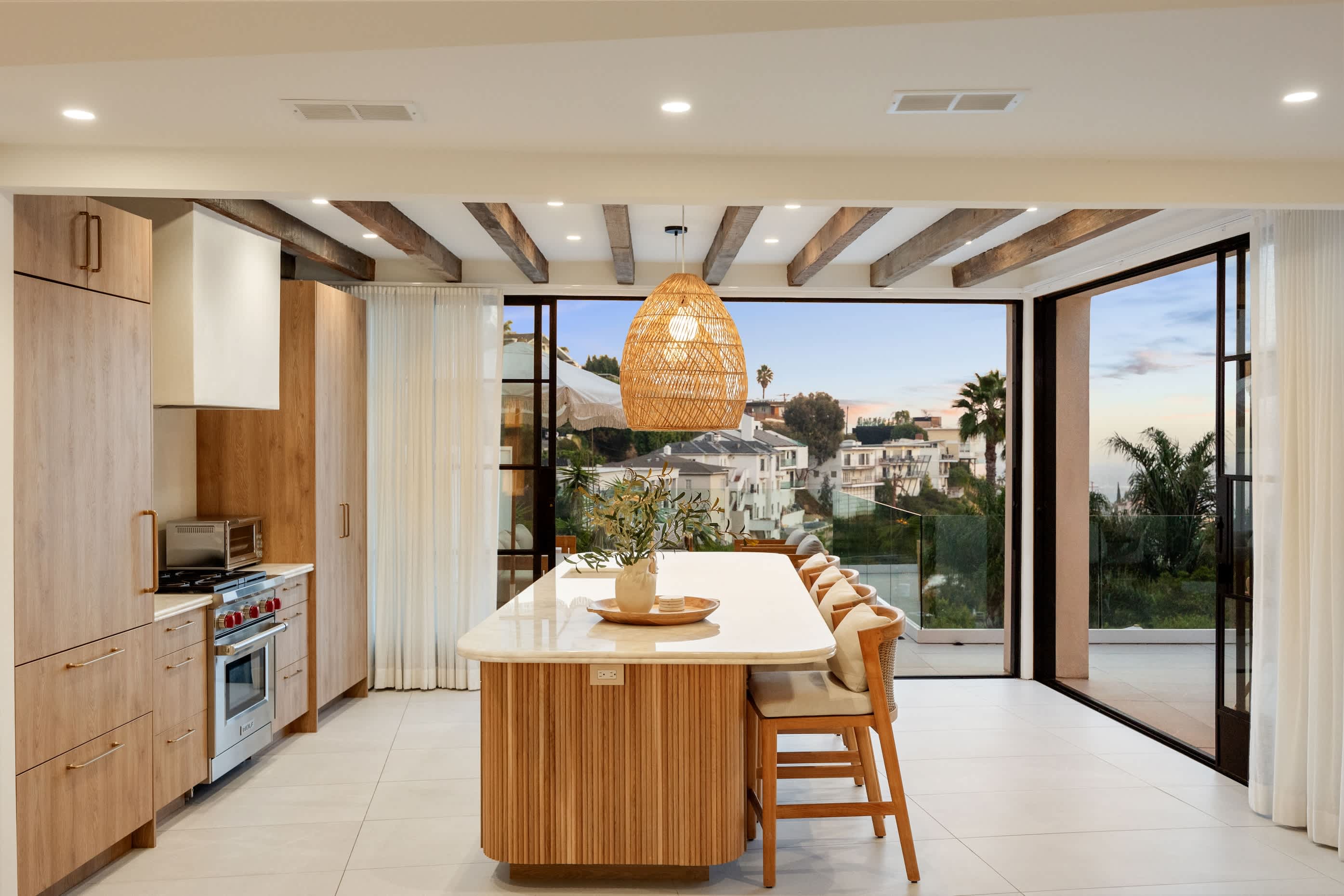 Fleetwood doors let you transition from cozy interiors to scenic patios.