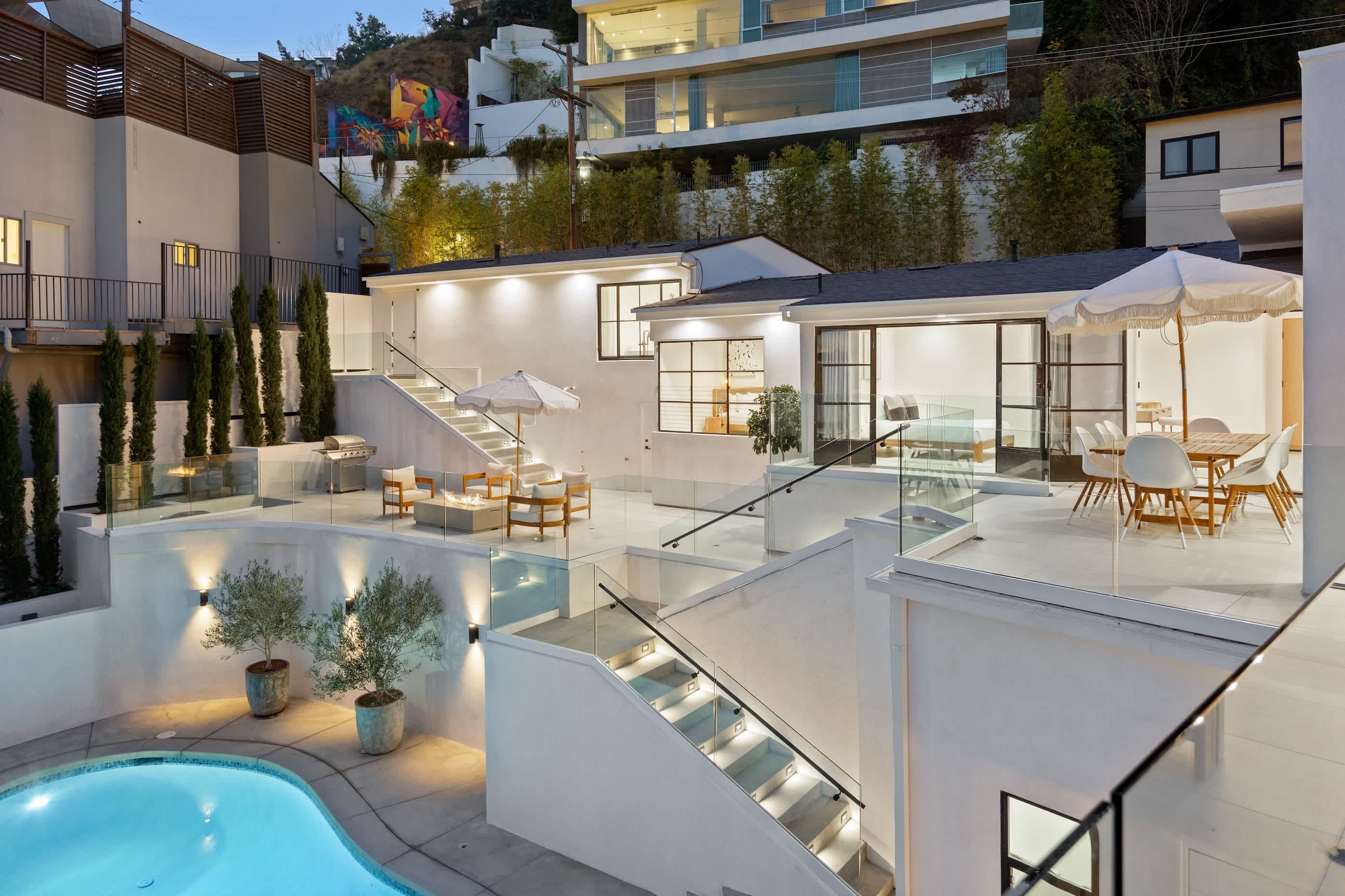 Elevate your stay with multi-level terraces and sweeping hillside views.