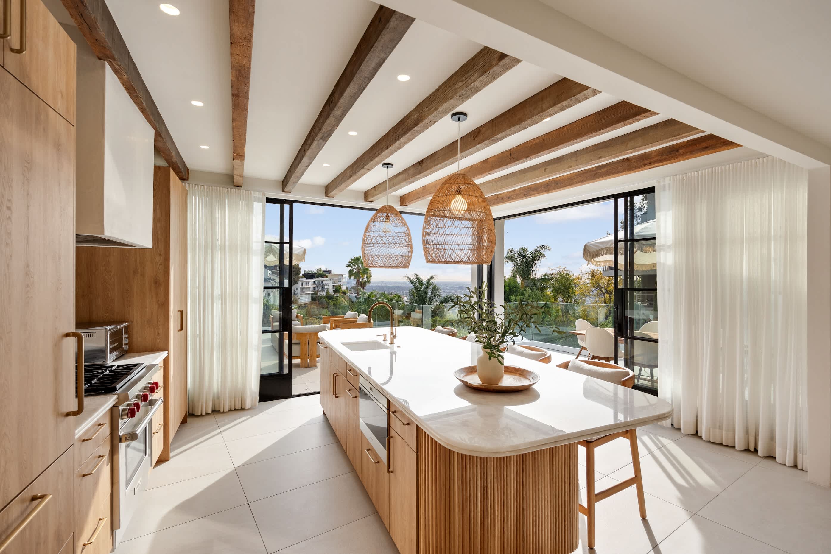 The heart of the home, blending modern design with hillside views.