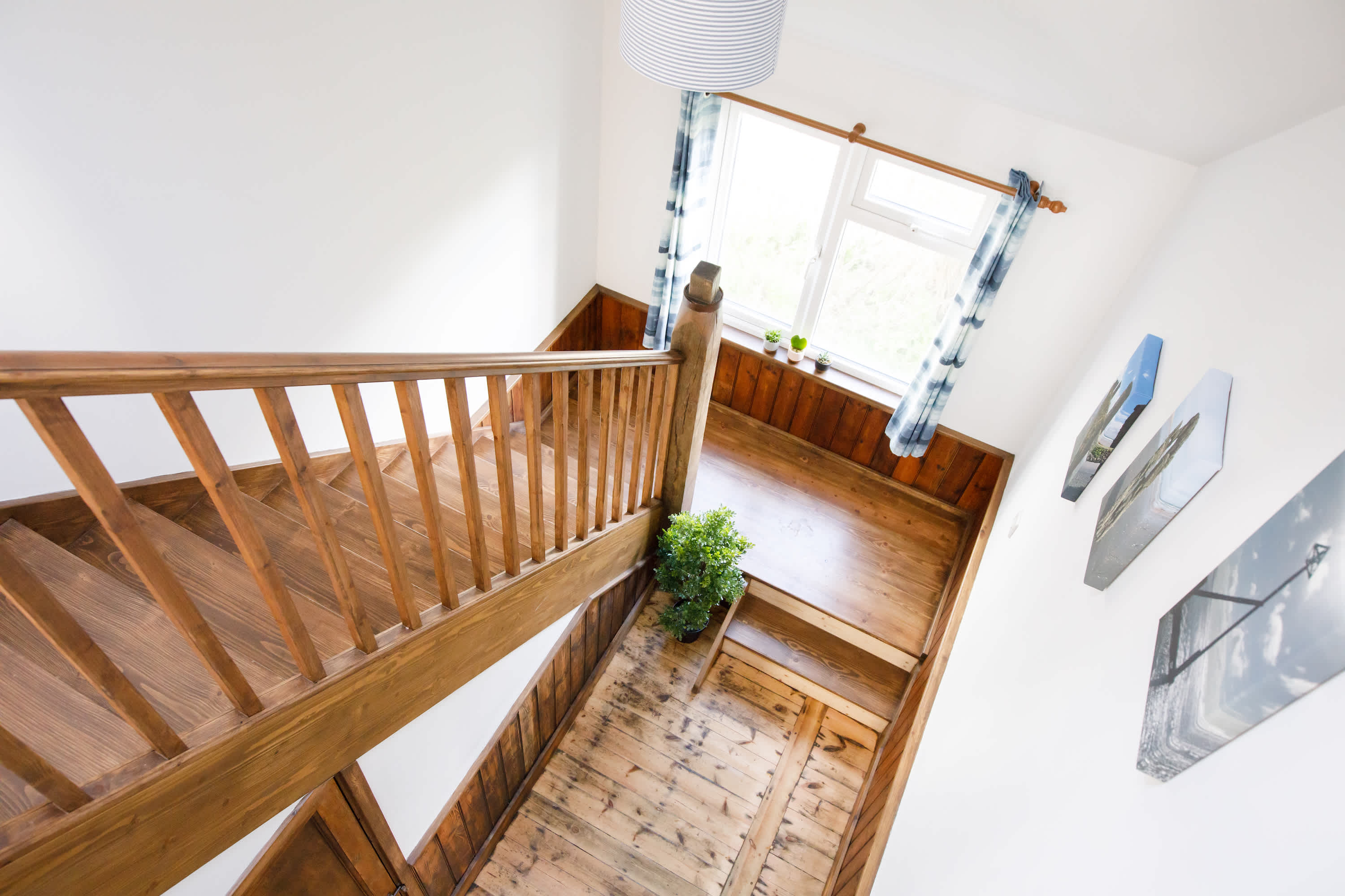The stunning wooden staircase takes you to the first floor