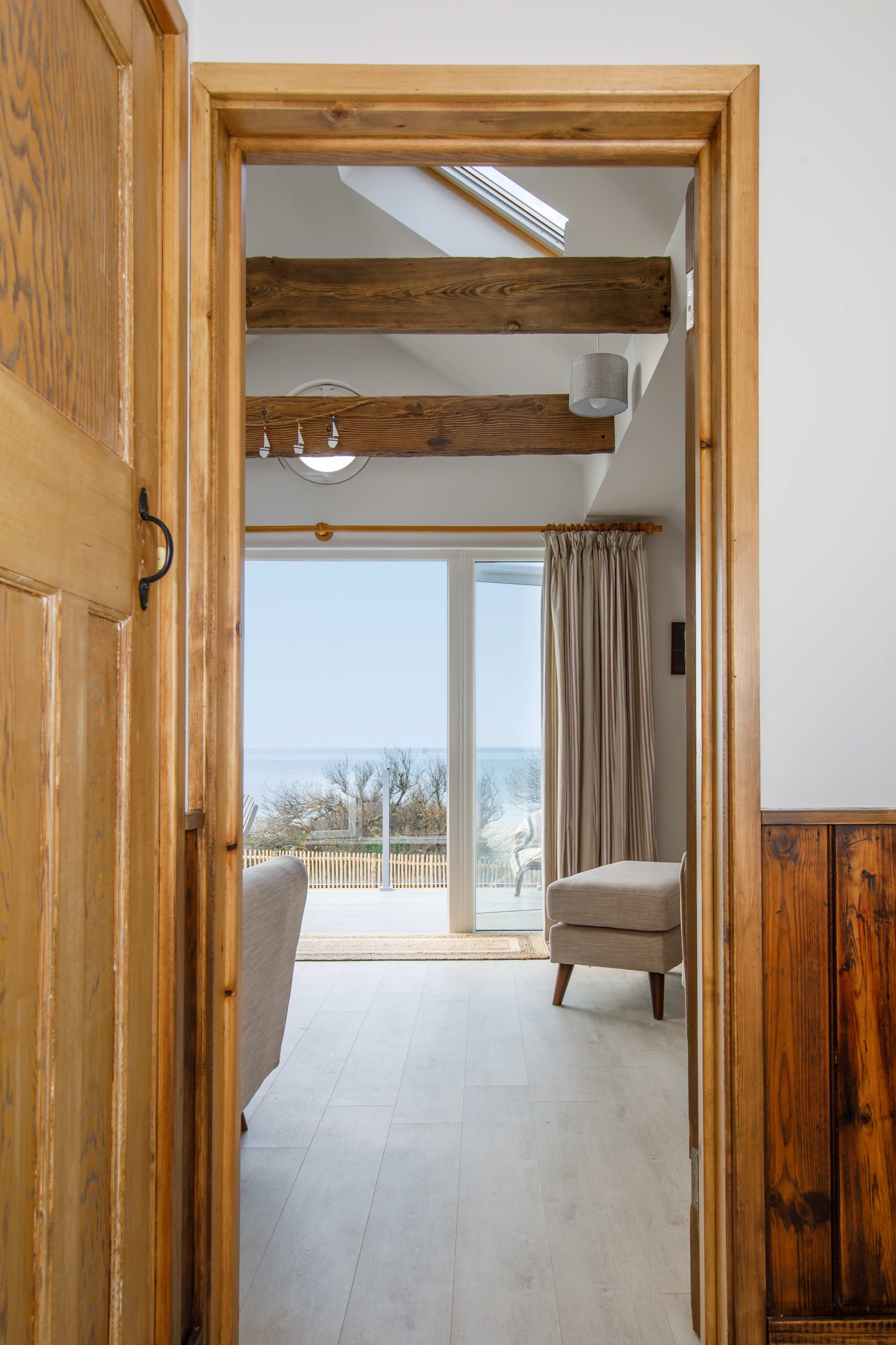 Exposed wooden beams add to the rustic ambiance