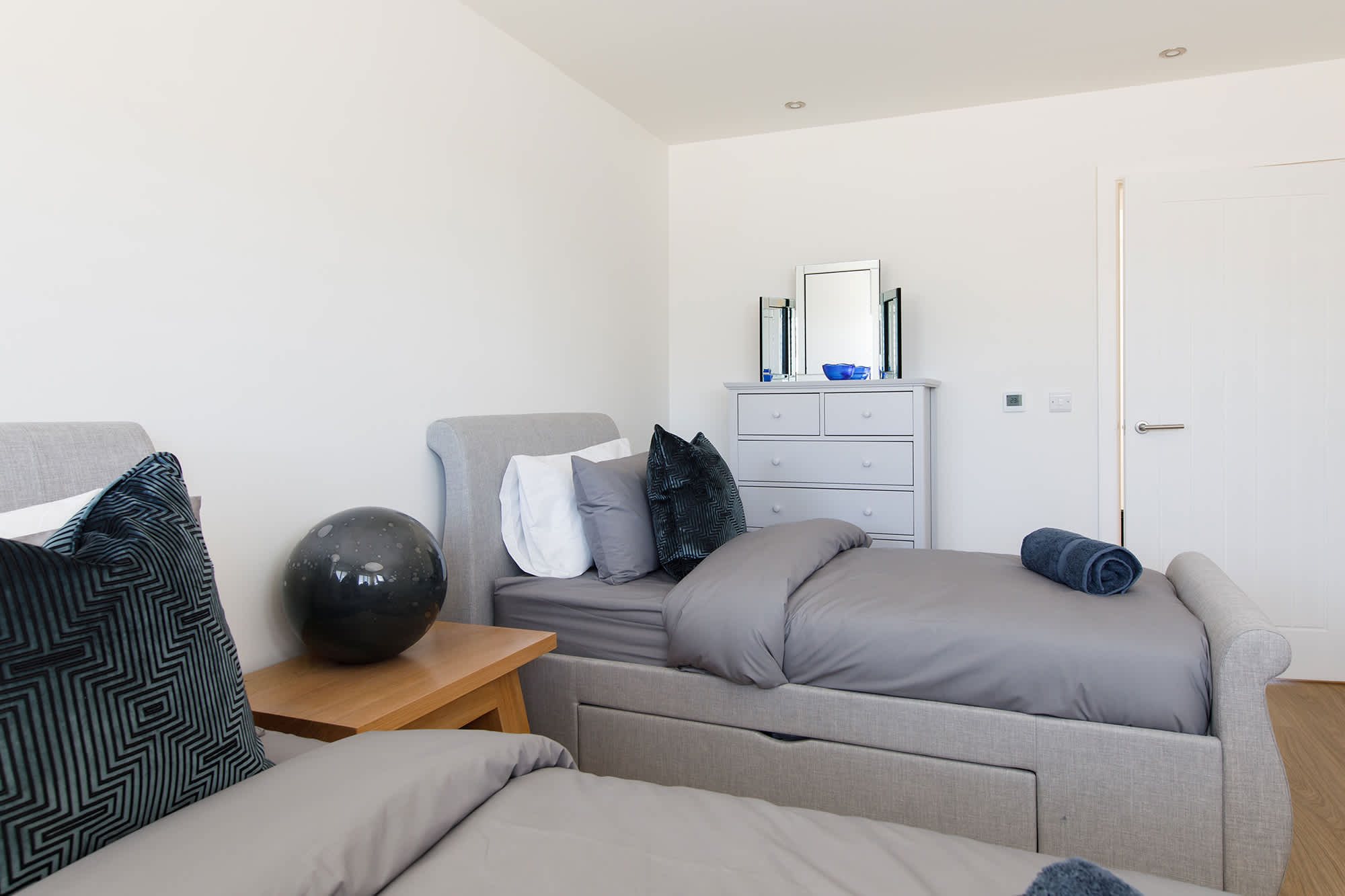 The rooms have spacious draws for all your belongings and side tables.