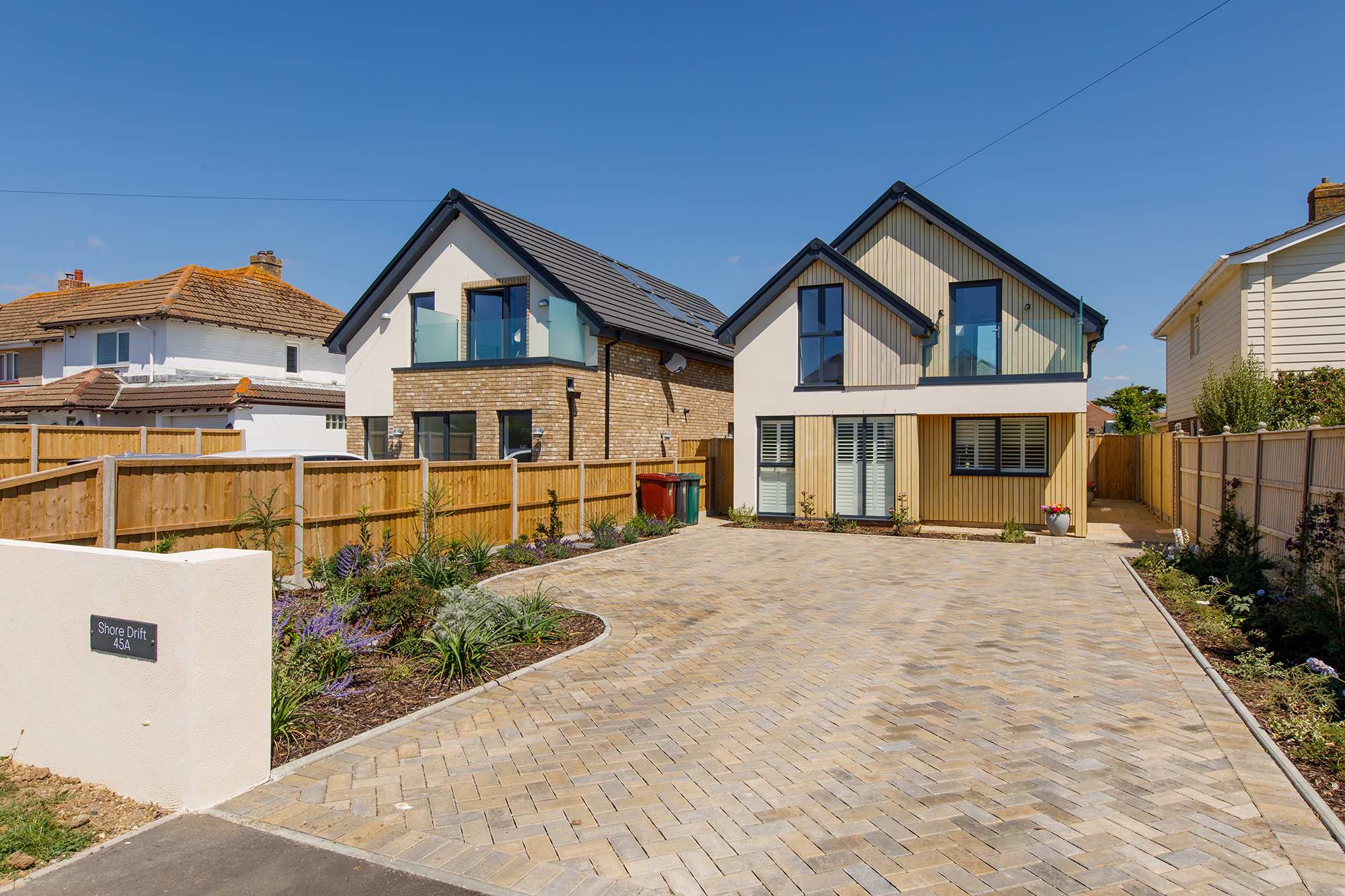 The newly built home has a large driveway to comfortably park 3/4 cars.