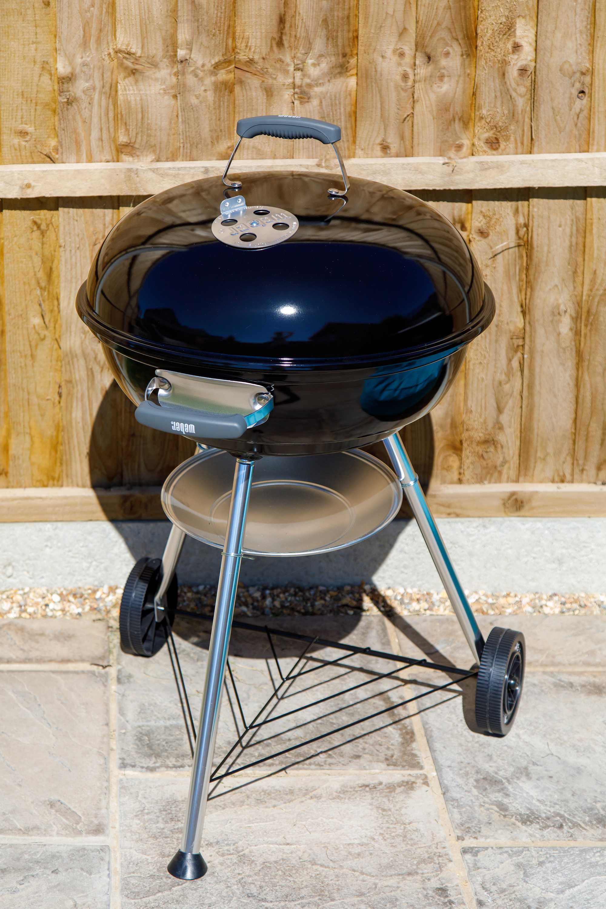 The home has a charcoal BBQ.