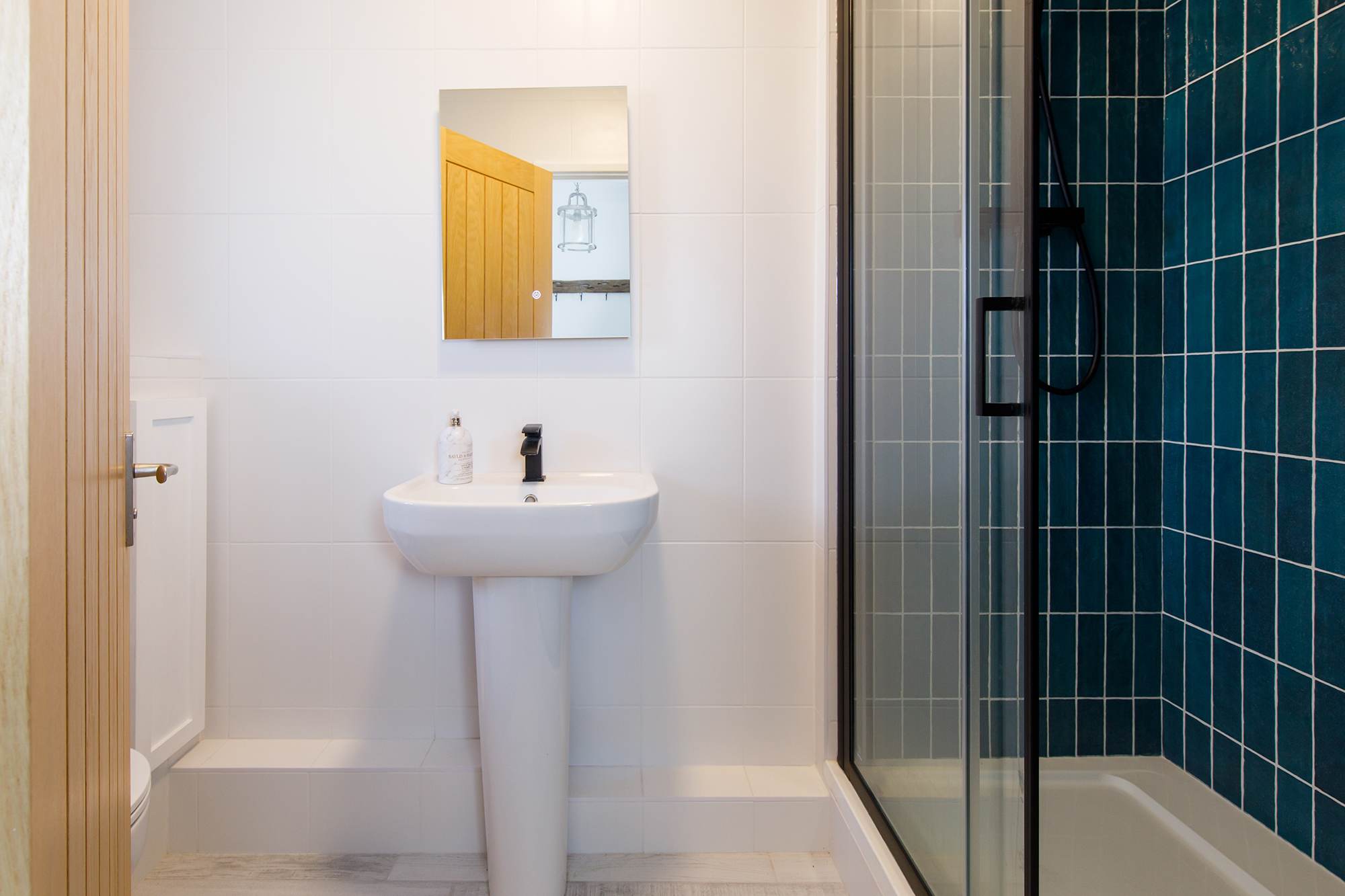 There is a handy downstairs shower room with WC and sink.