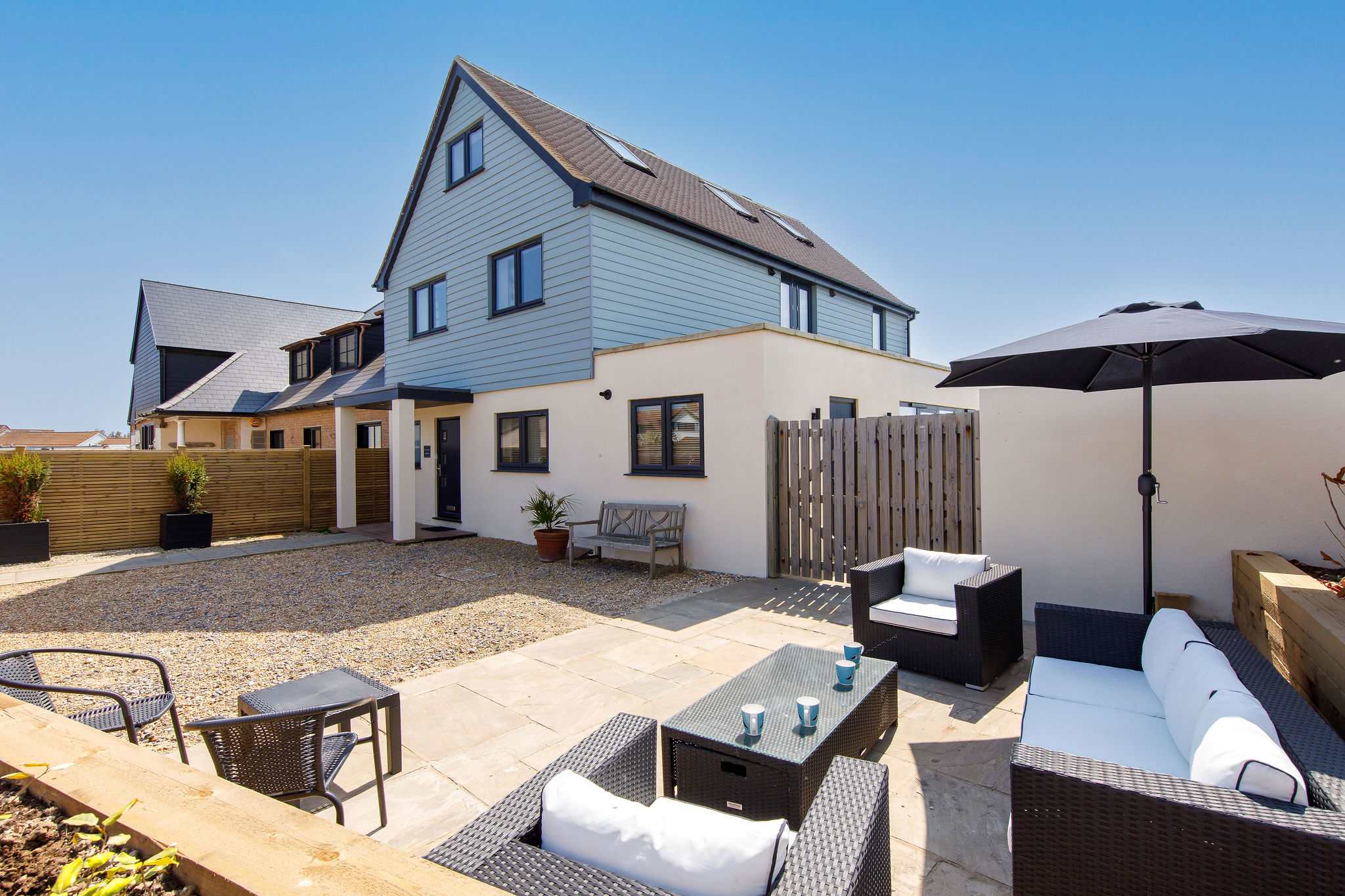 There is seating on the front patio as well as the back. The perfect spot for a morning coffee in the sunshine.