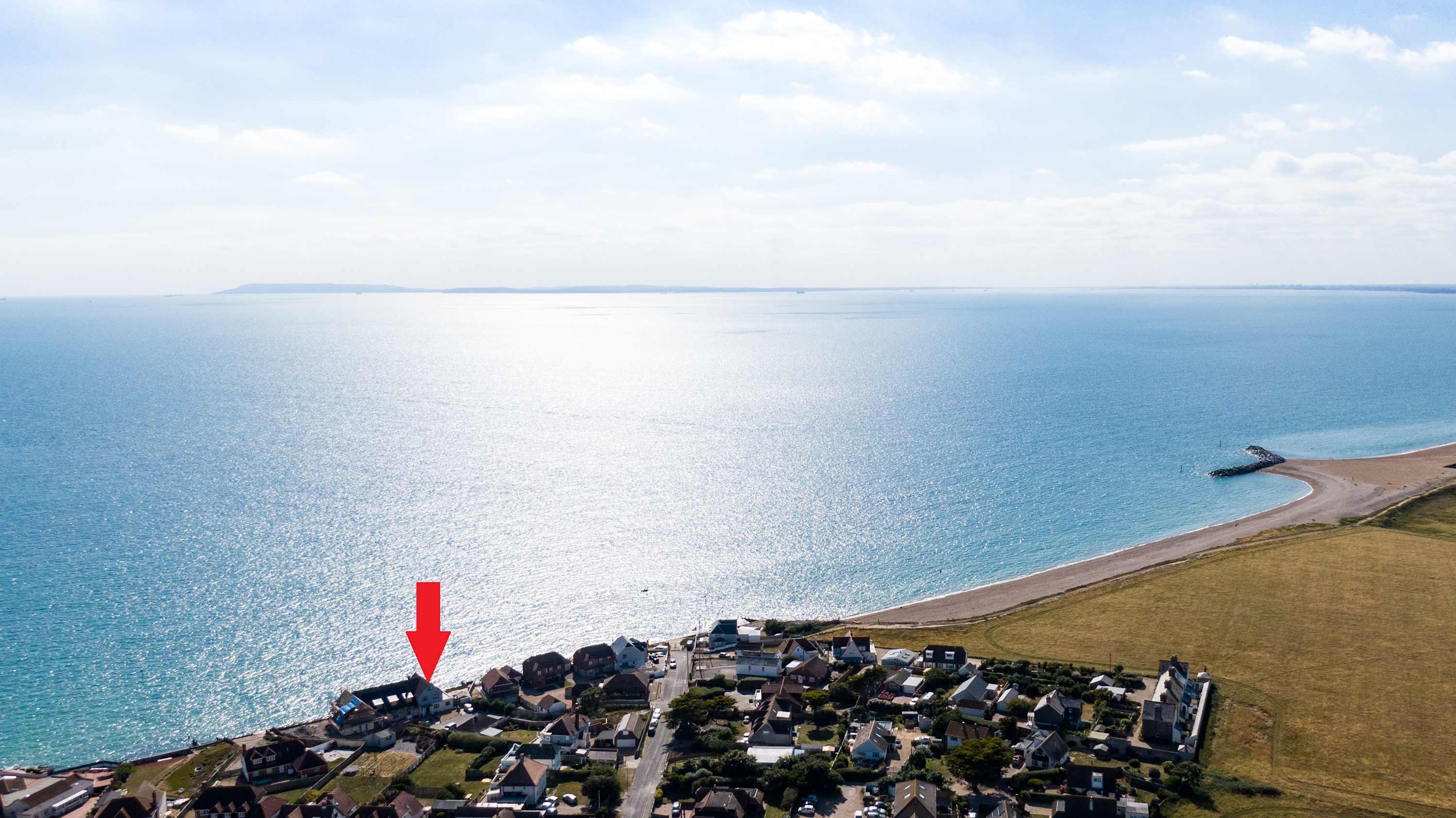 The blue waters of the english channel and the position of The Sea House, looking across to The Isle of Wight.