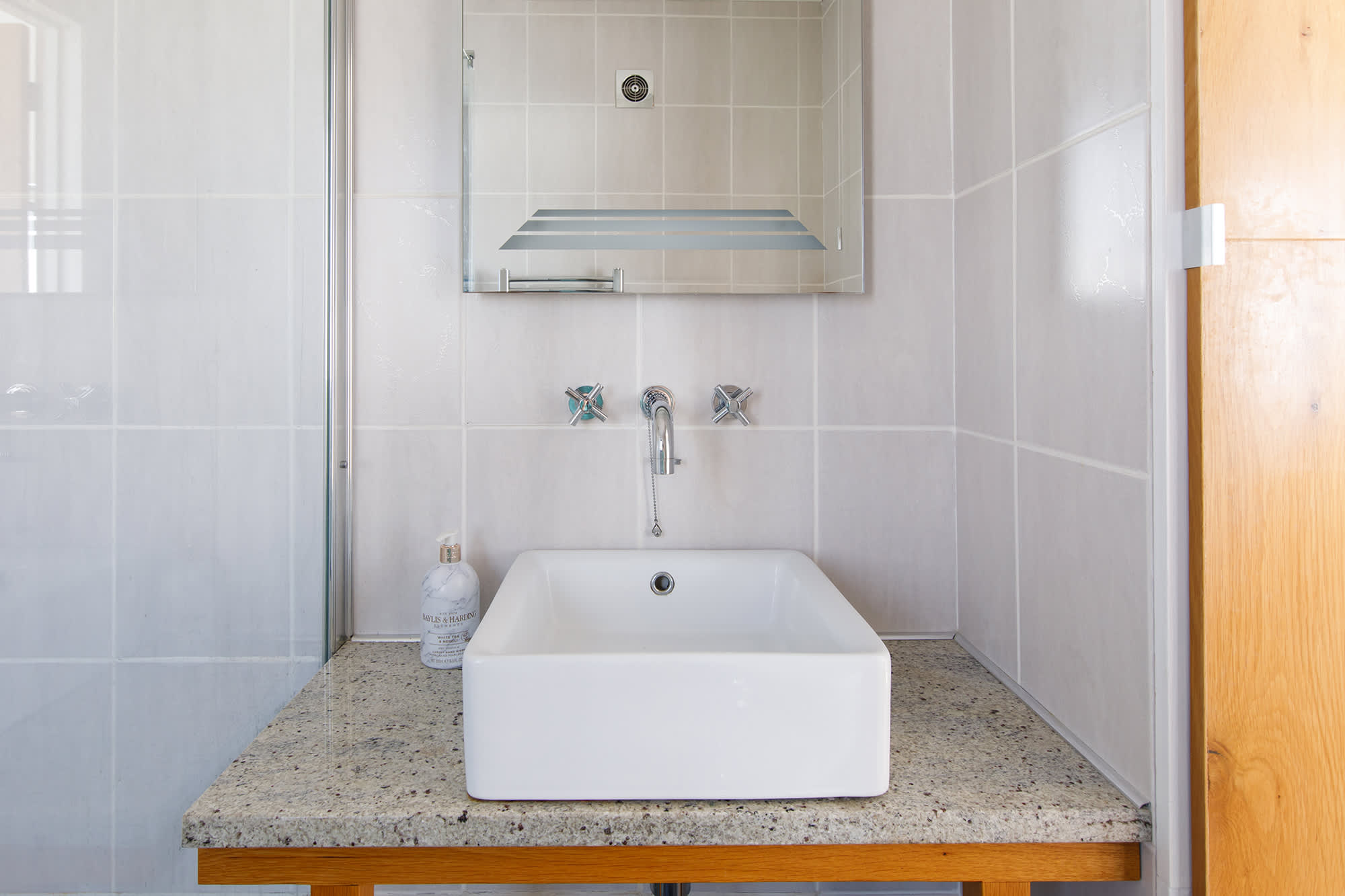 Master bedroom ensuite, with walk in shower, WC and basin.