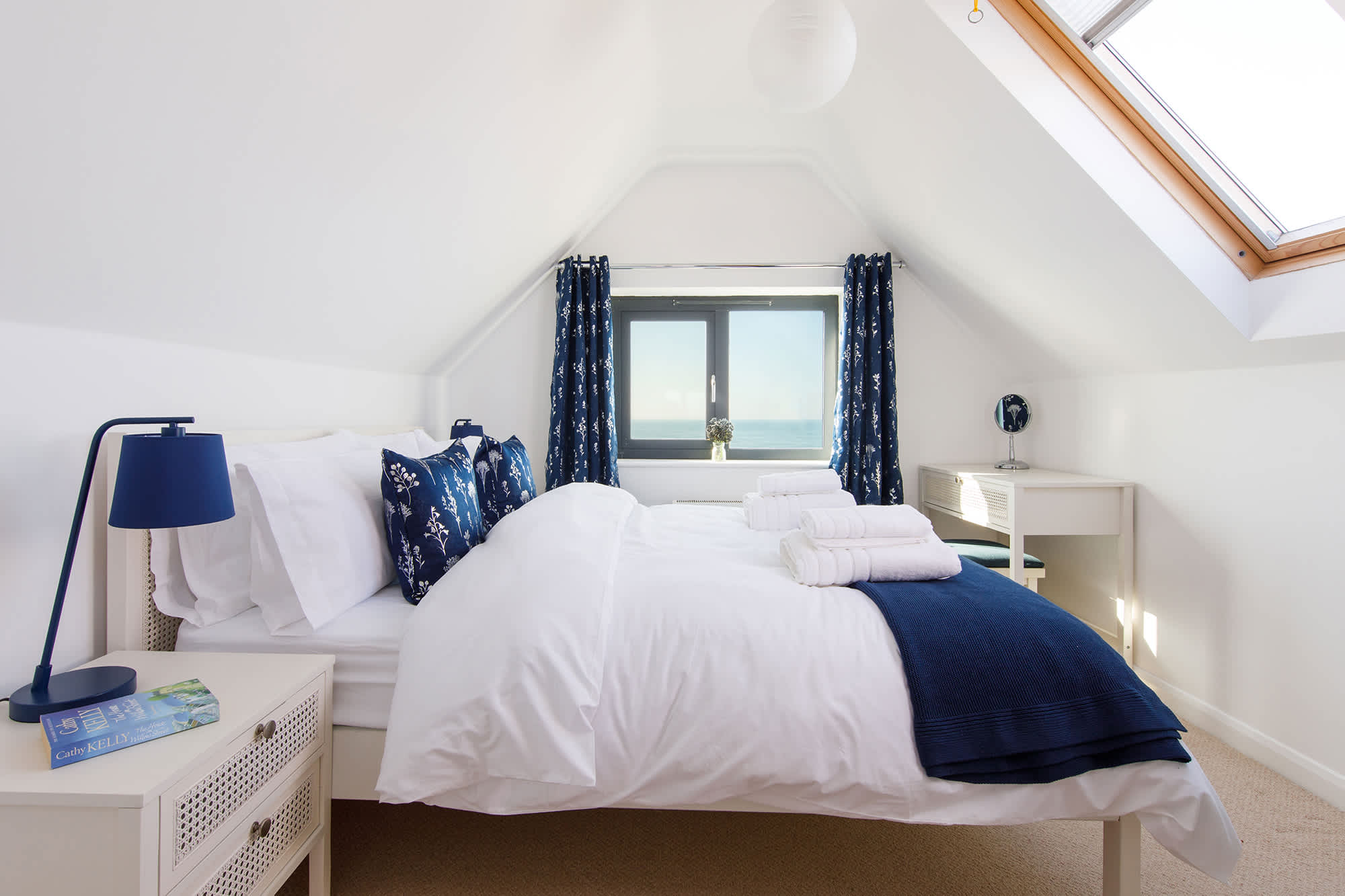 This king room has stunning views across the ocean.