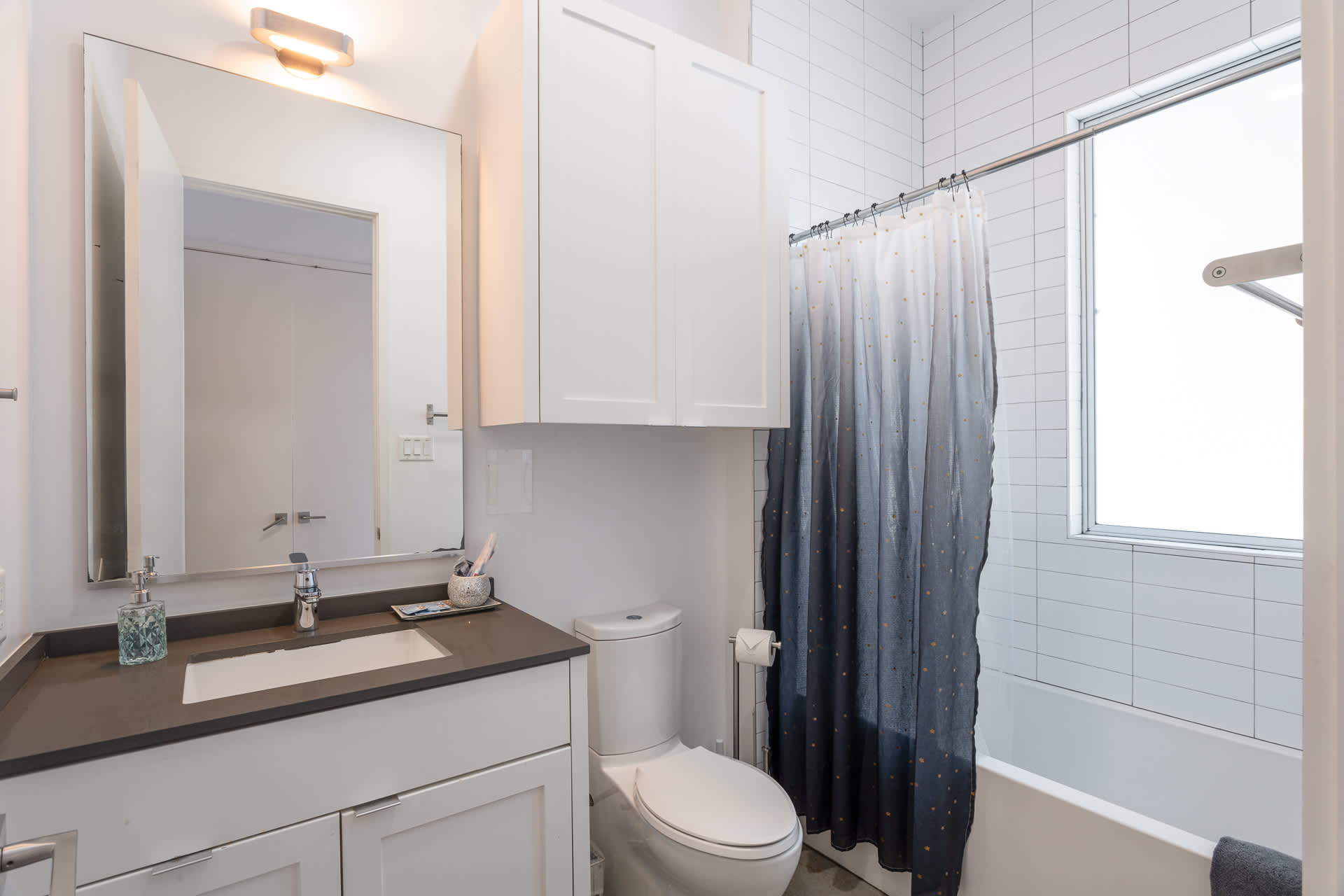 Full Bathroom with Combined Bathtub and Shower
